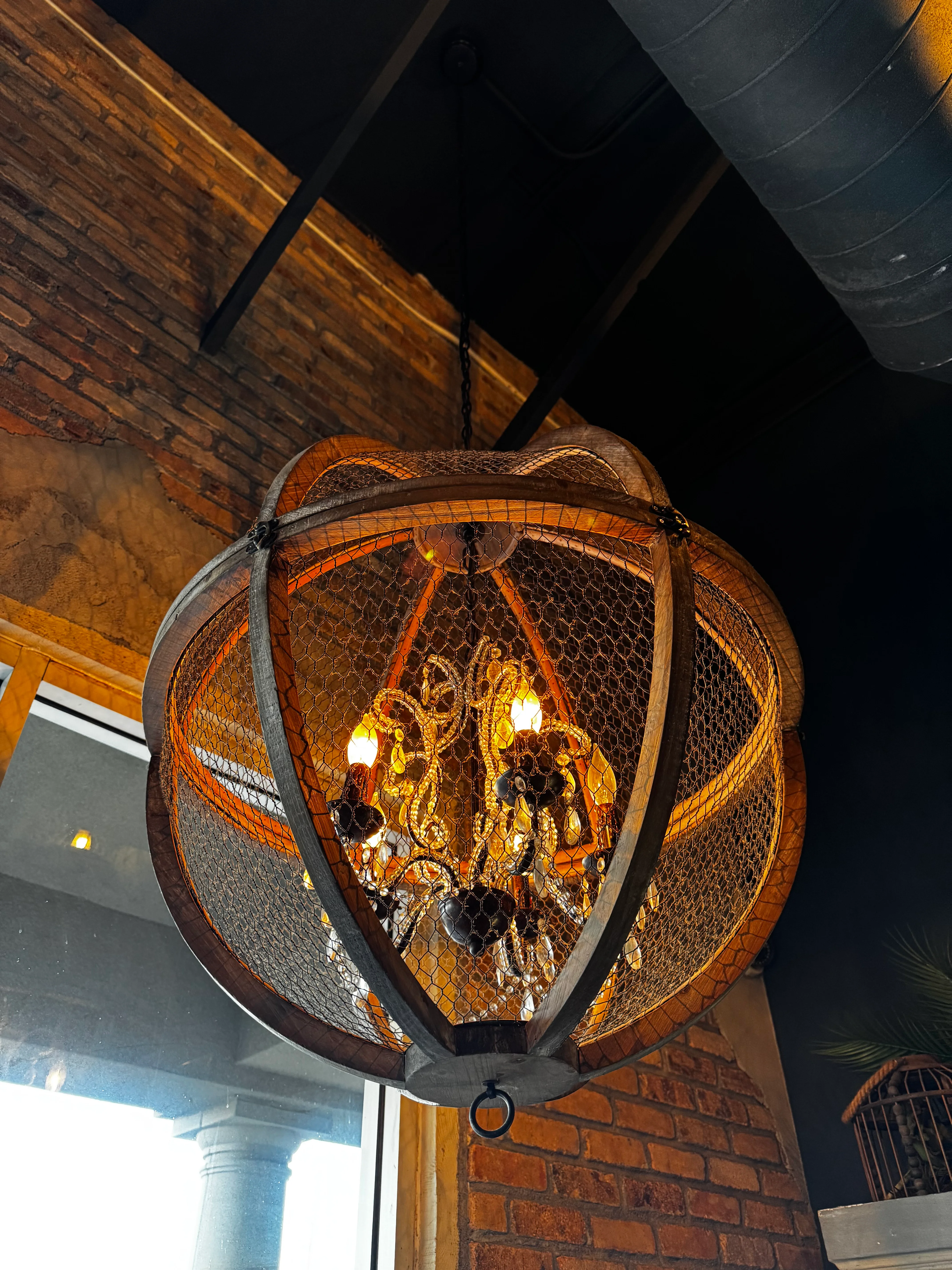 Stylish chandelier in a rustic restaurant interior