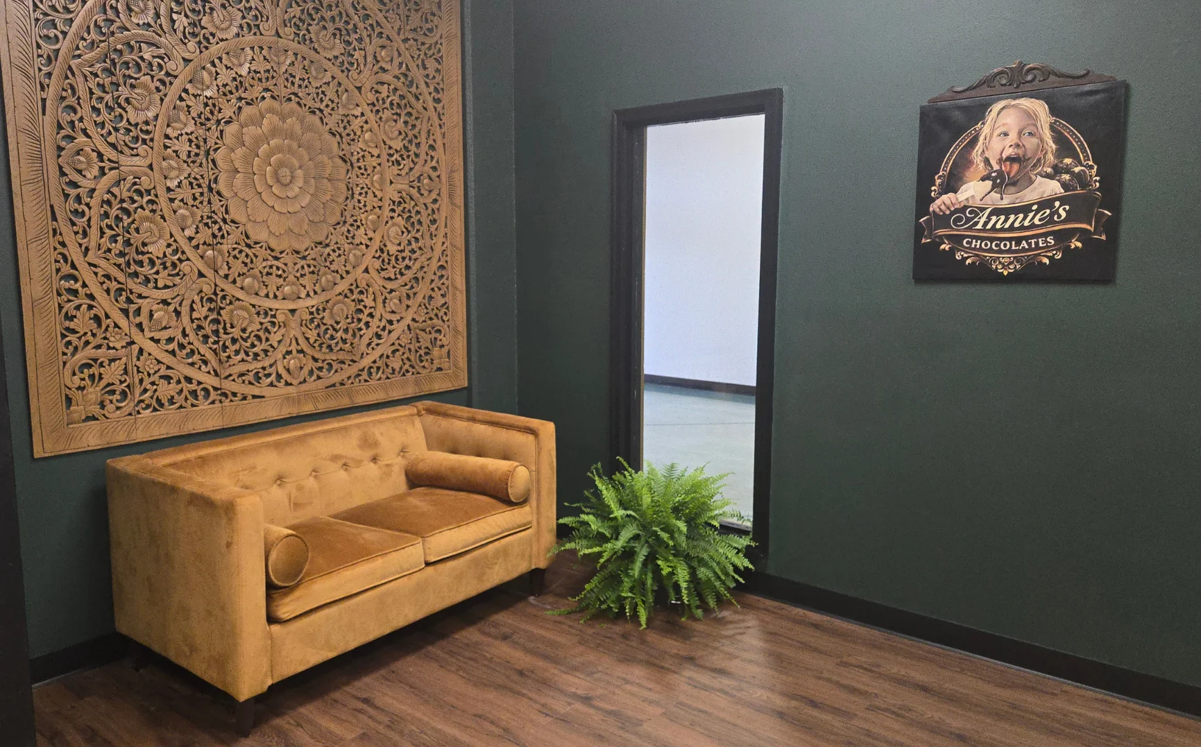 Cozy restaurant interior with decorative wall and plush seating