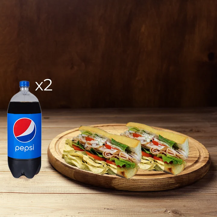 Delicious sub sandwich with chips and soft drink
