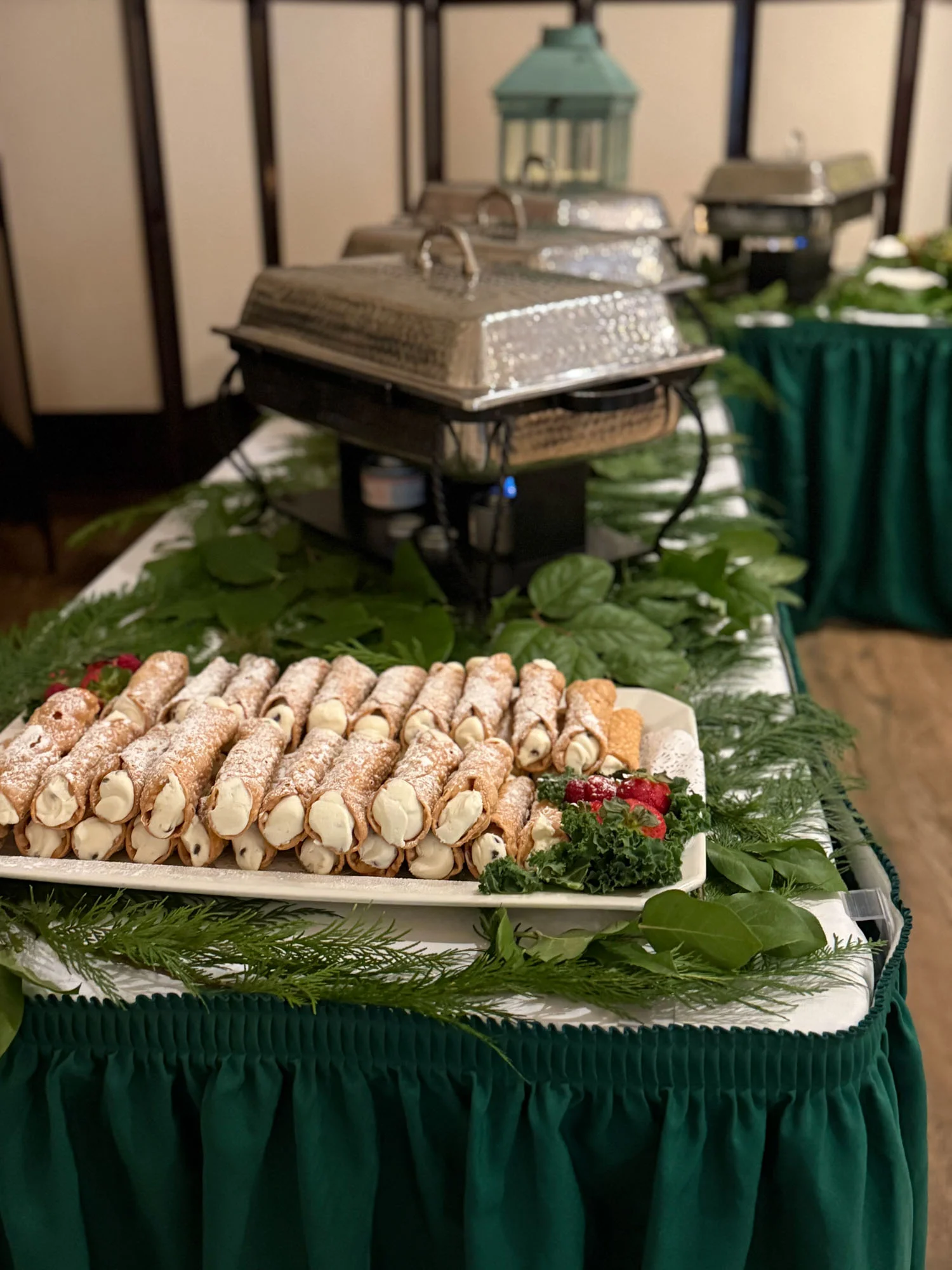 Italian cannoli dessert platter with powdered sugar
