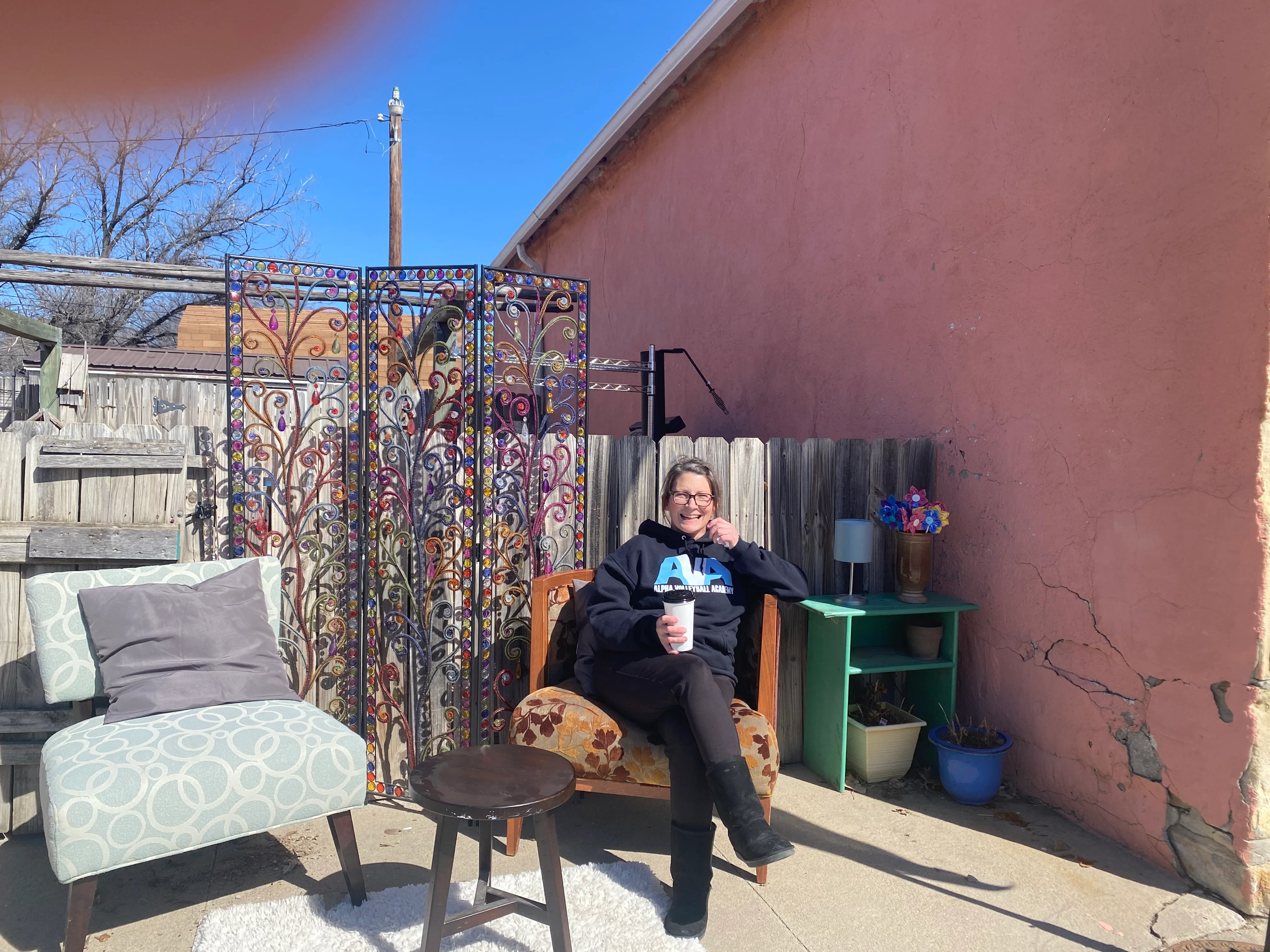 Cozy outdoor seating area with colorful decor