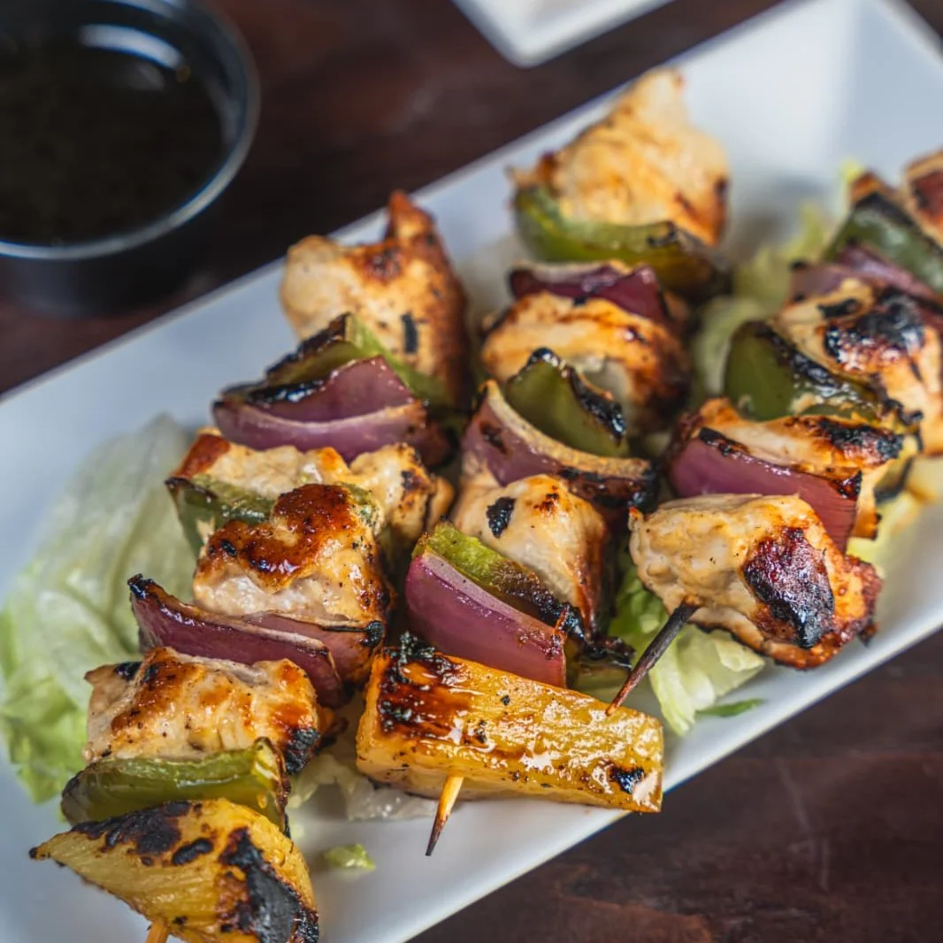 Grilled chicken kebabs with vegetables