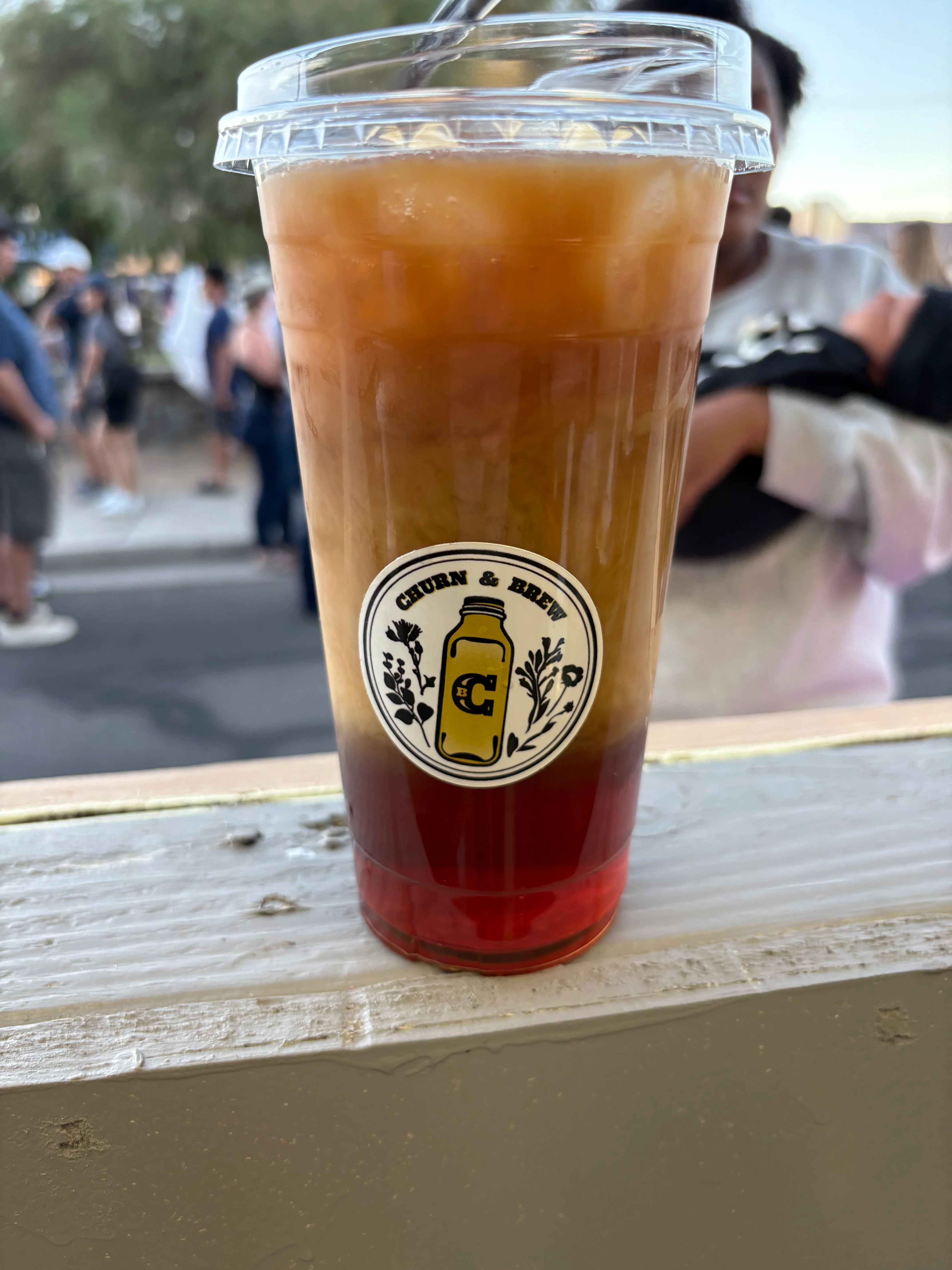 Close-up of amber craft beer in a branded pint glass