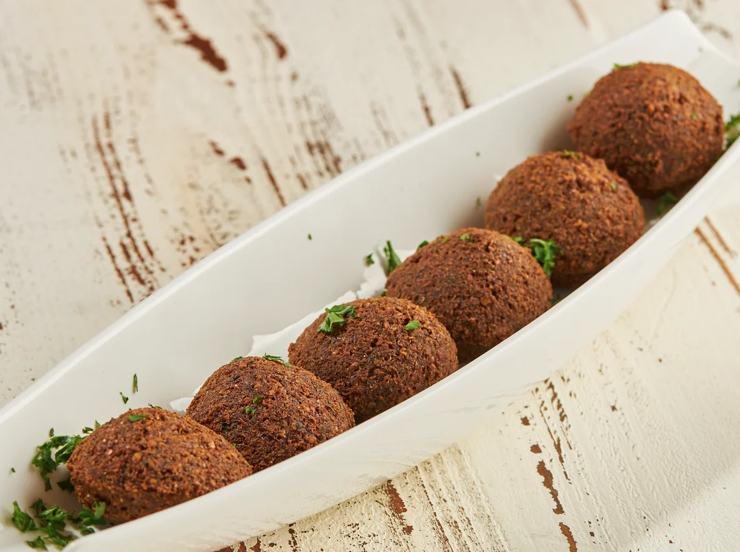Falafel served with Tahini sauce. 