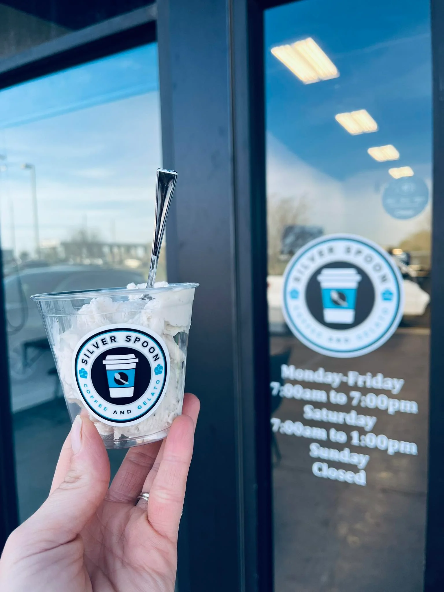 Delicious gelato in various flavors served in a cup.