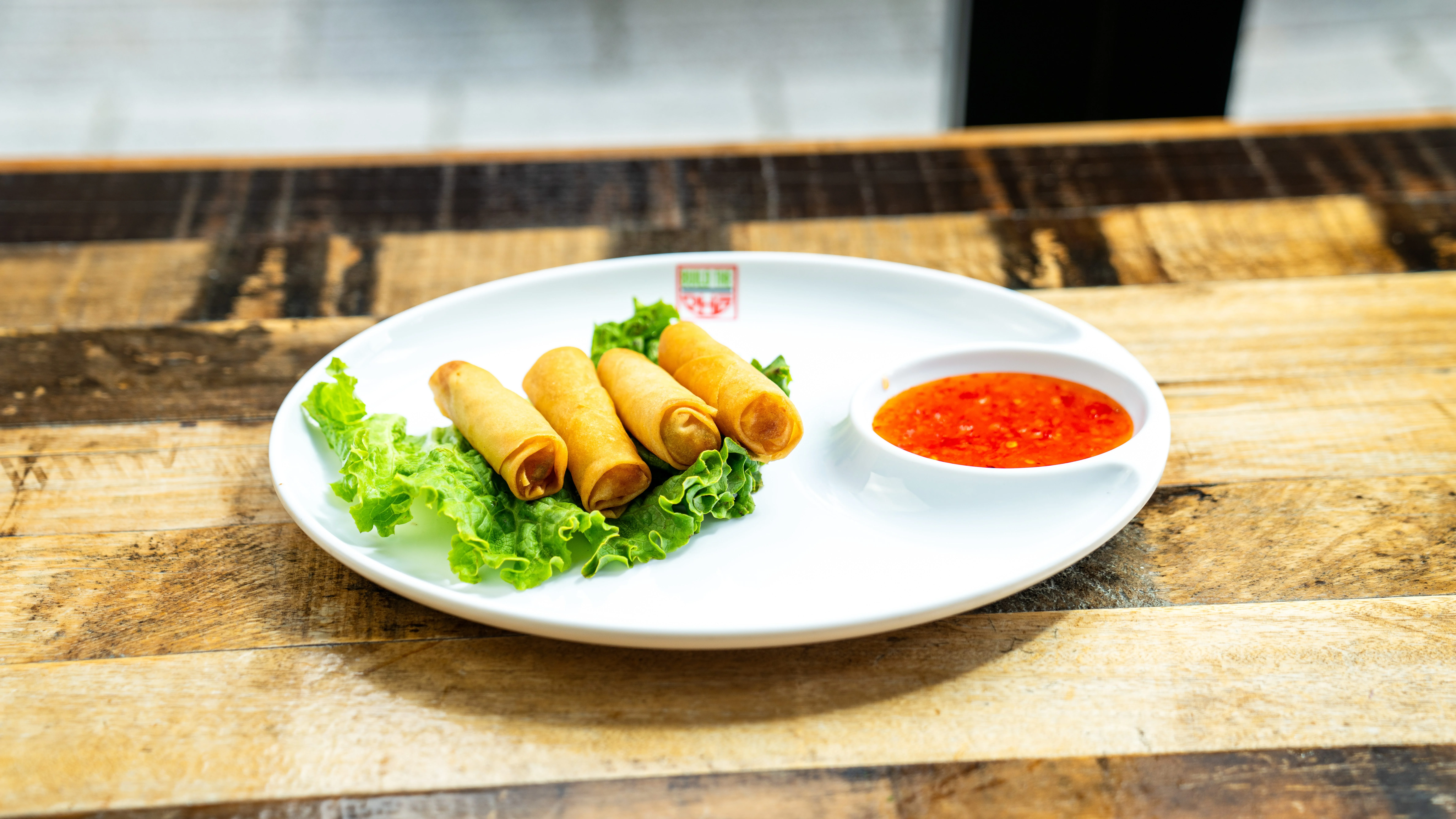 Crispy Vietnamese spring rolls with dipping sauce
