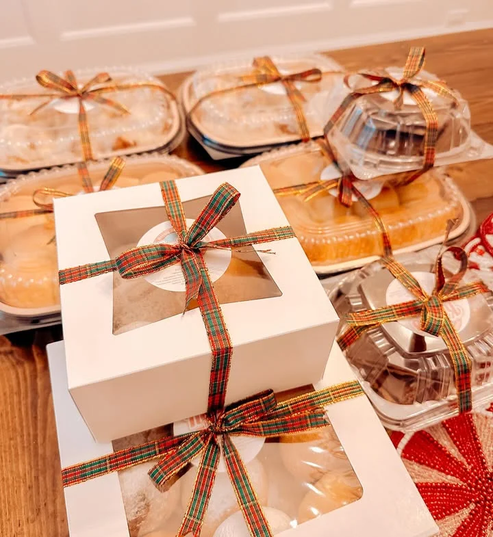 Festively packaged desserts in decorative boxes