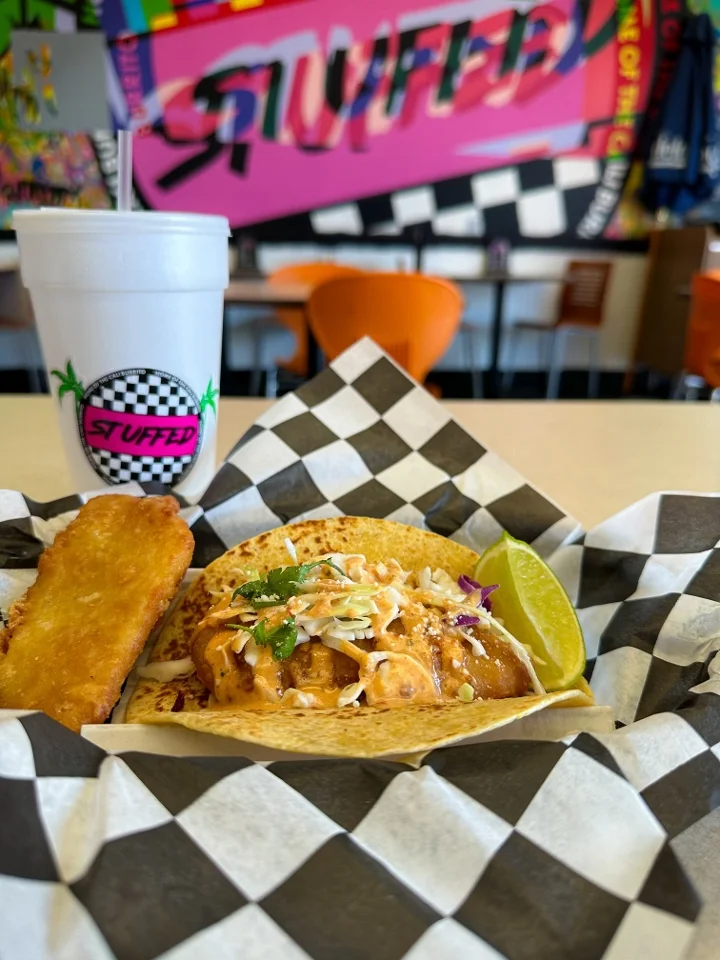 Fish tacos served with chips at Stuffed Burritos