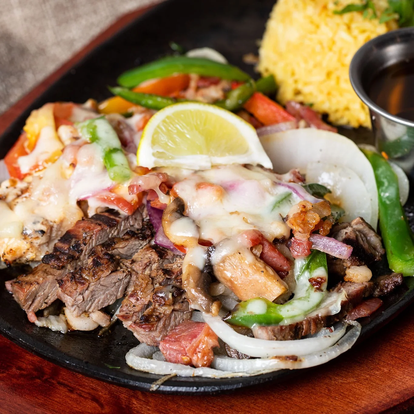 Sizzling fajitas with grilled steak and vegetables
