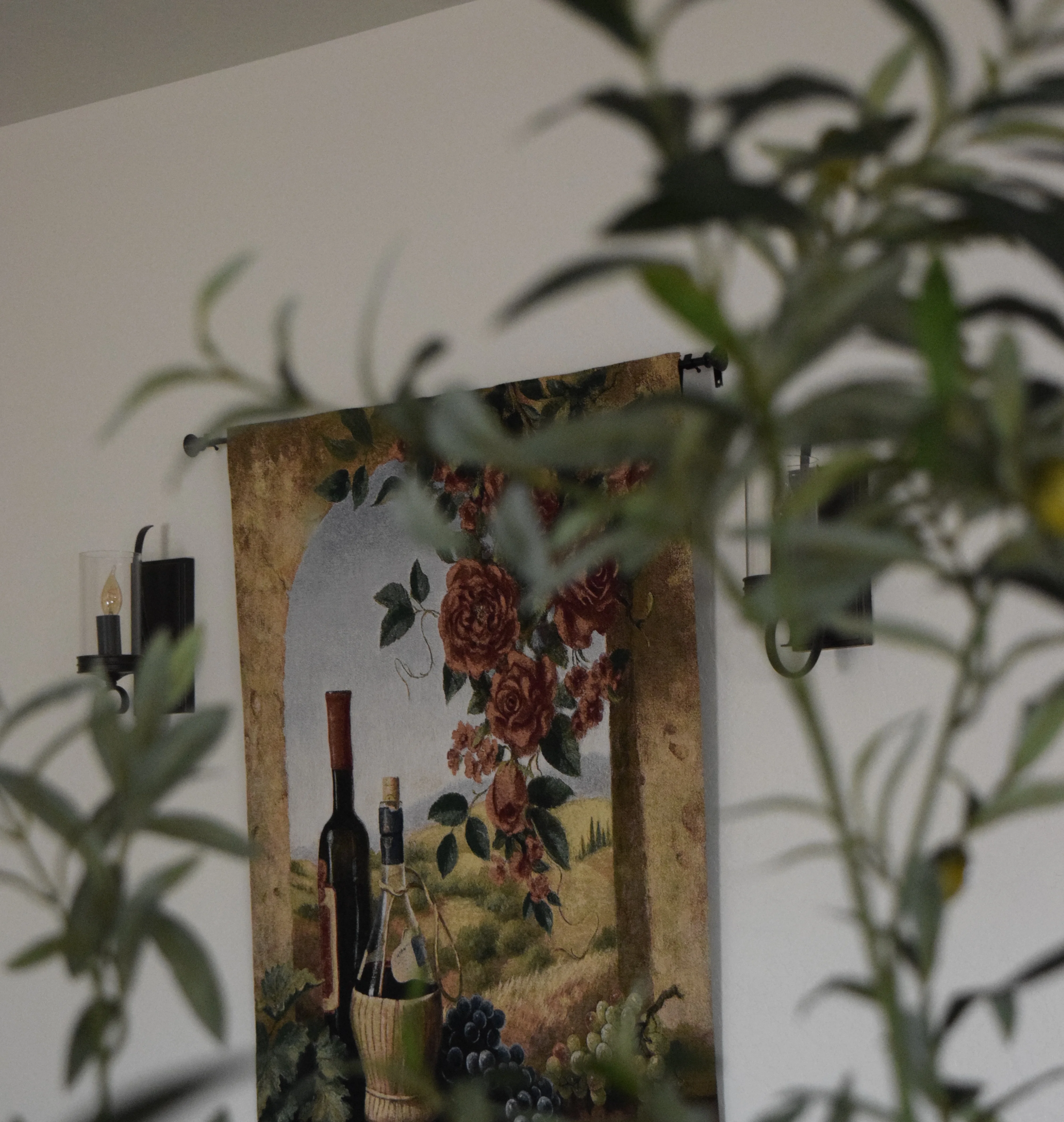 Cozy restaurant interior with a vintage clock and grapes on the table