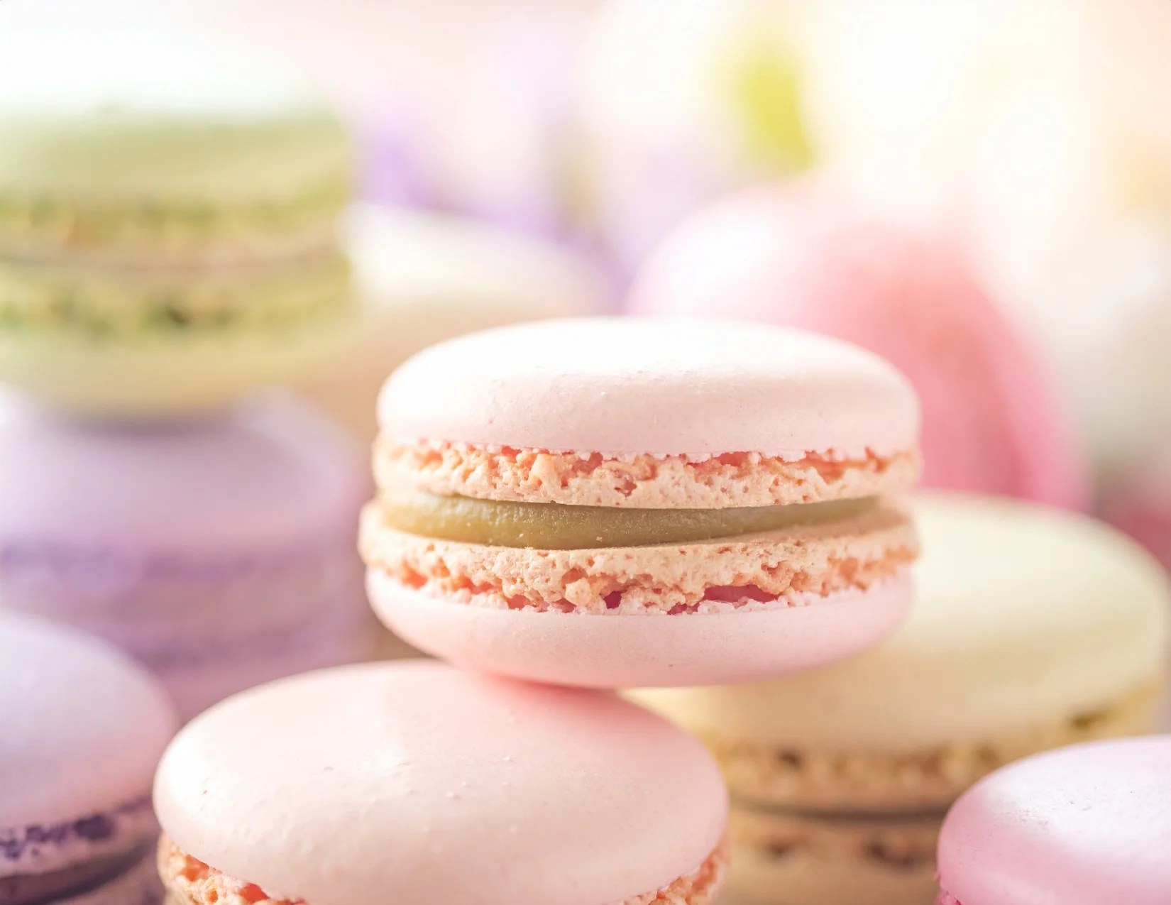 Colorful French macarons stacked elegantly