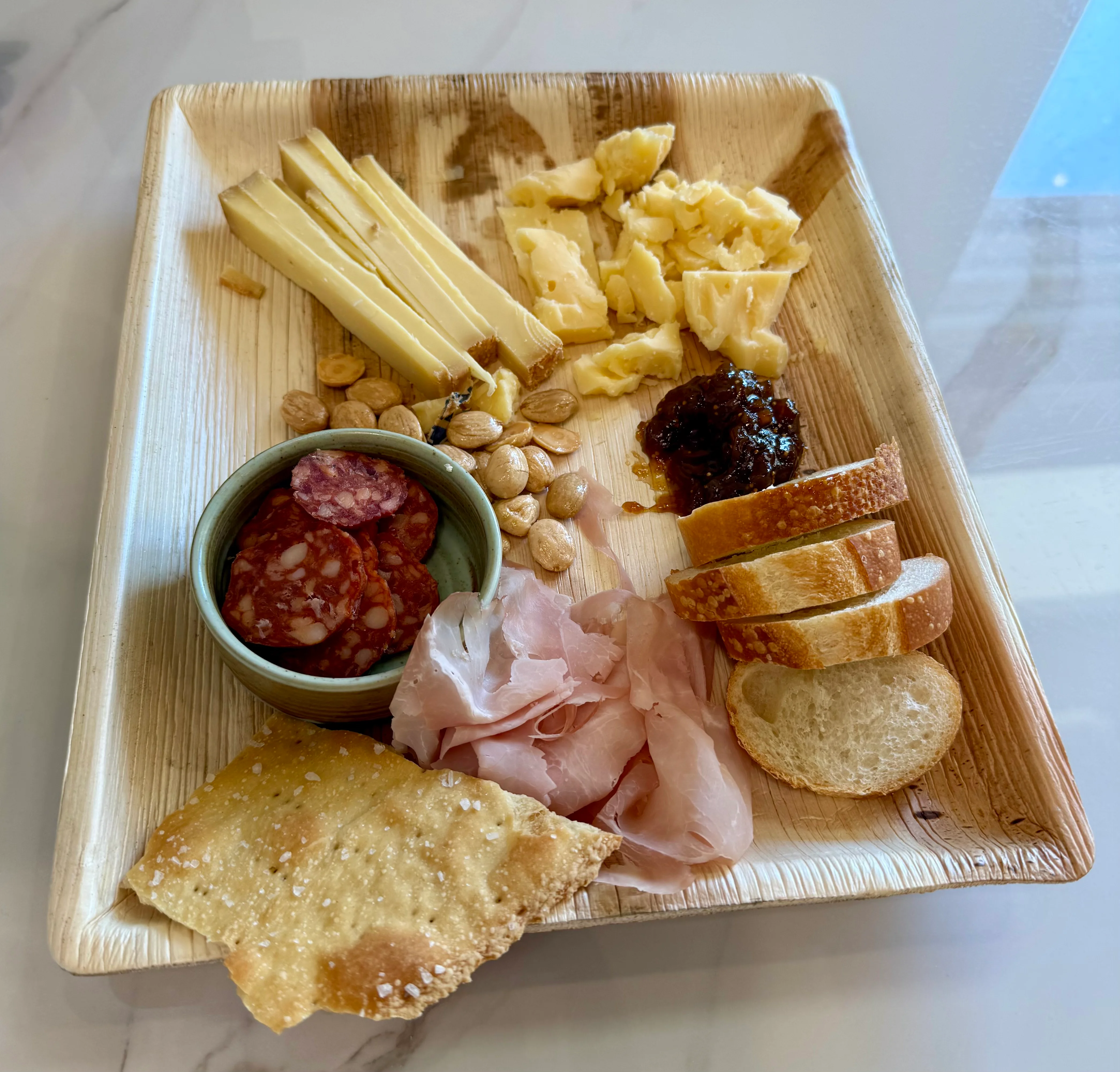 Delicious gourmet burger with fresh toppings on a wooden table