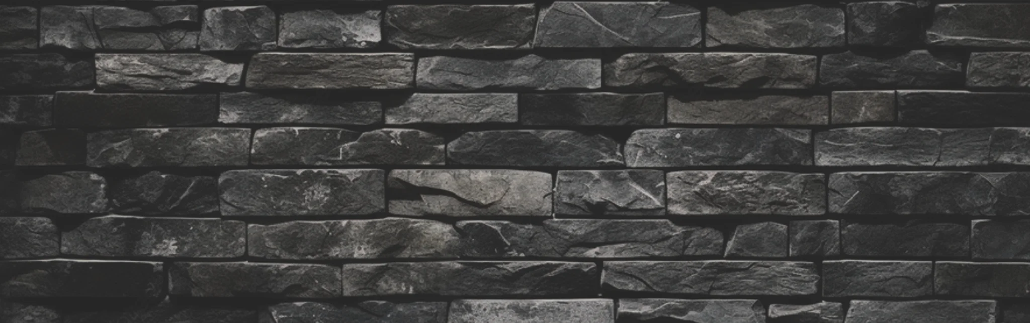 Textured black stone wall background for restaurant decor
