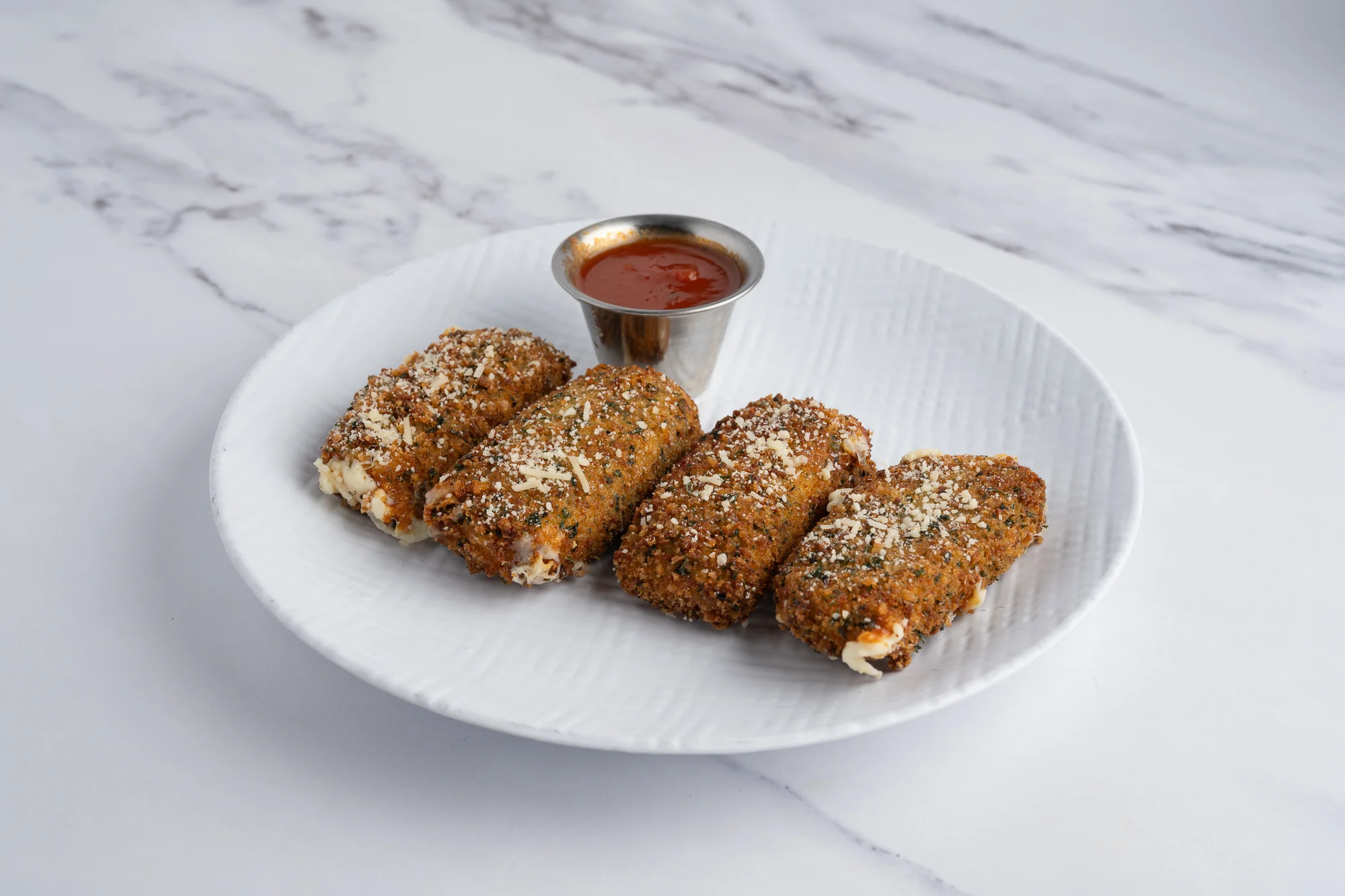 Crispy Italian arancini served with marinara sauce