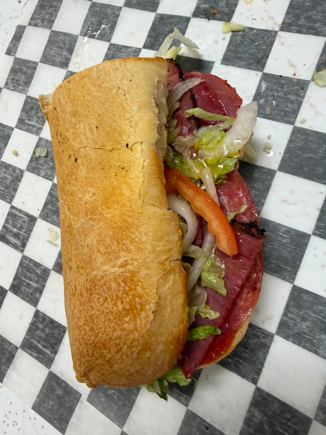 Classic Italian sub sandwich with assorted meats and fresh vegetables