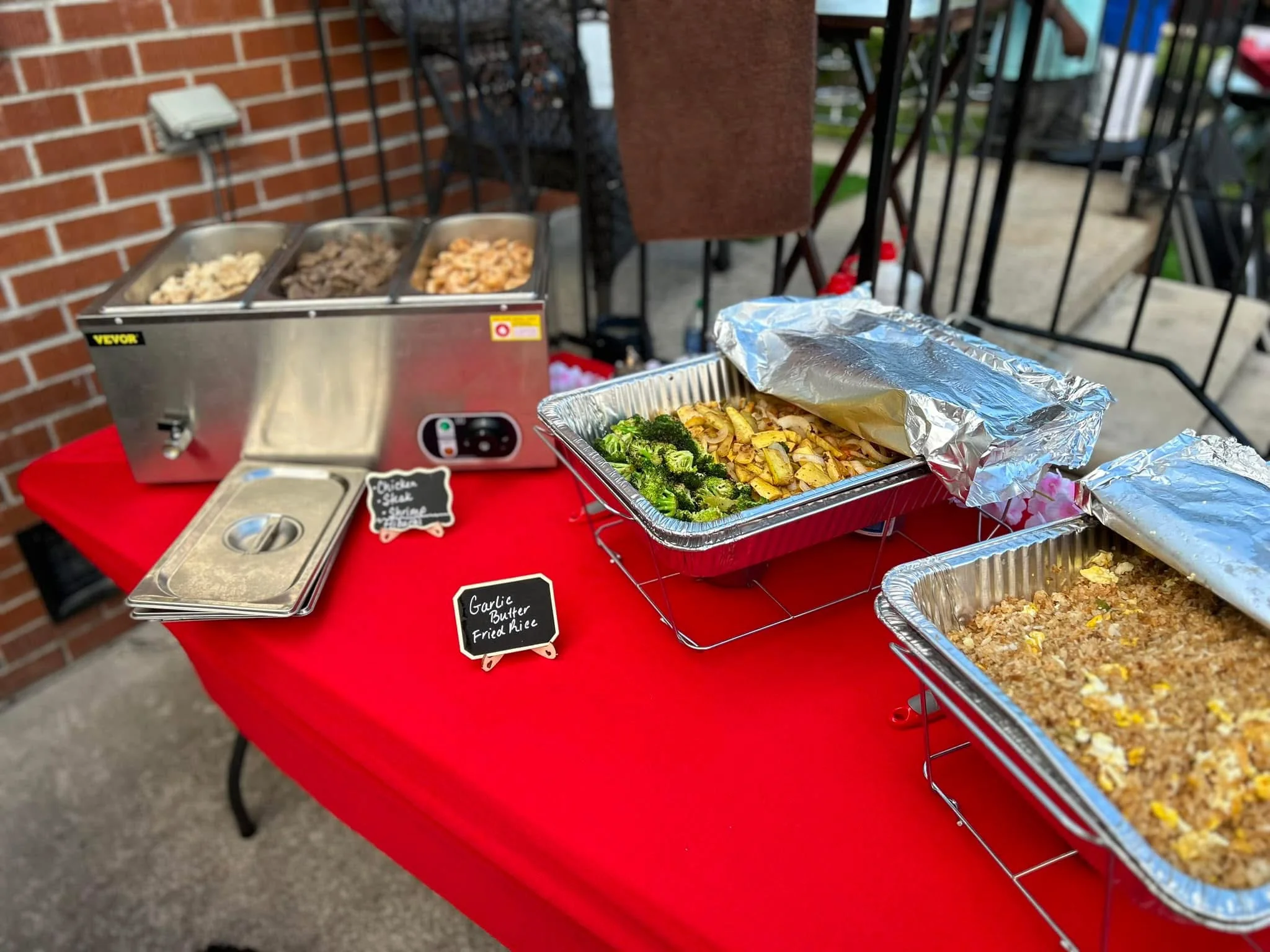 Assorted Asian stir-fry dishes on a buffet table