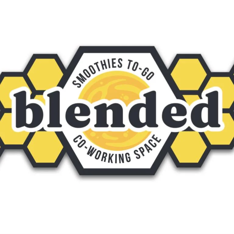 A colorful logo for a co-working space and smoothie shop, featuring a honeycomb design and bold text.