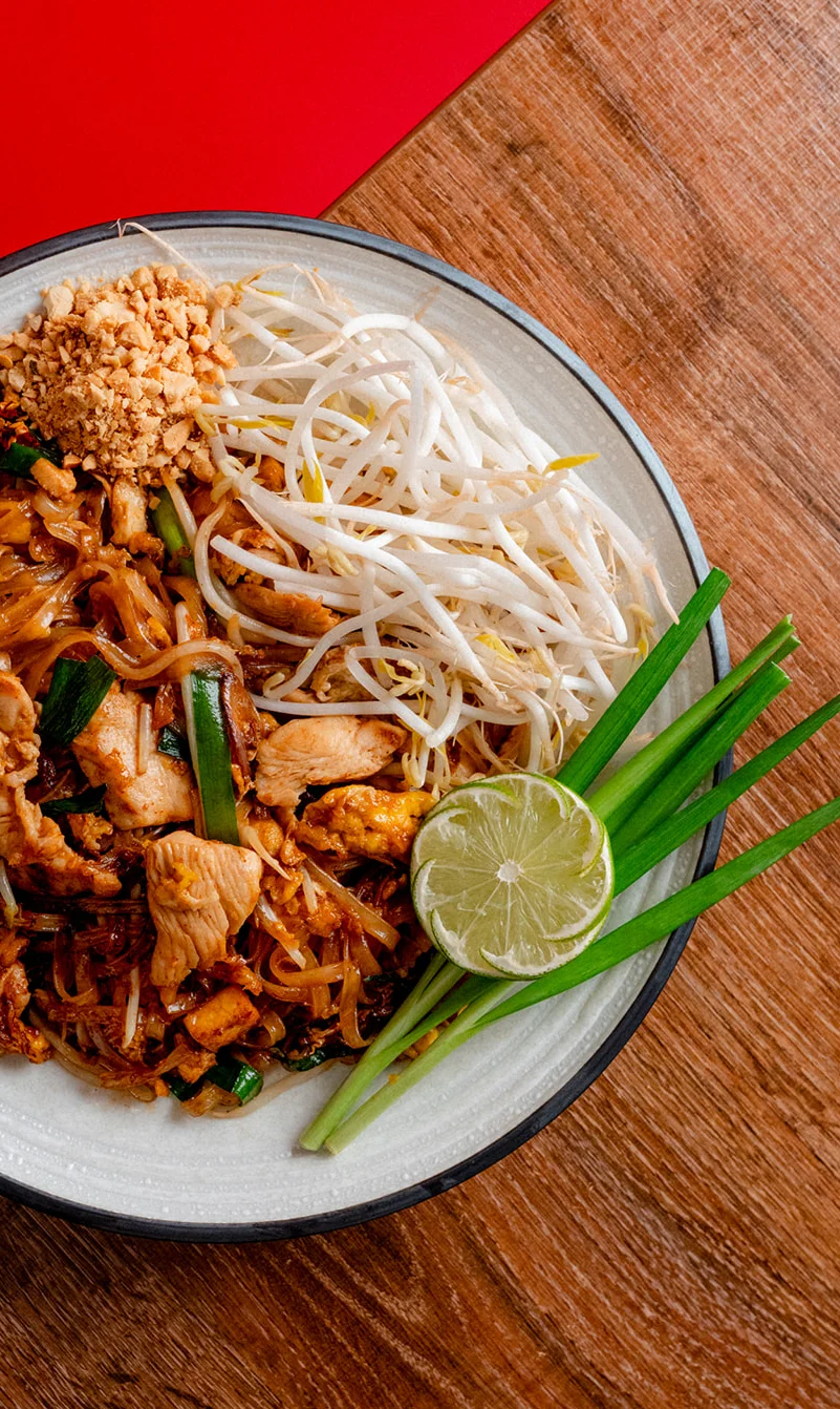 Delicious pad thai with shrimp and lime