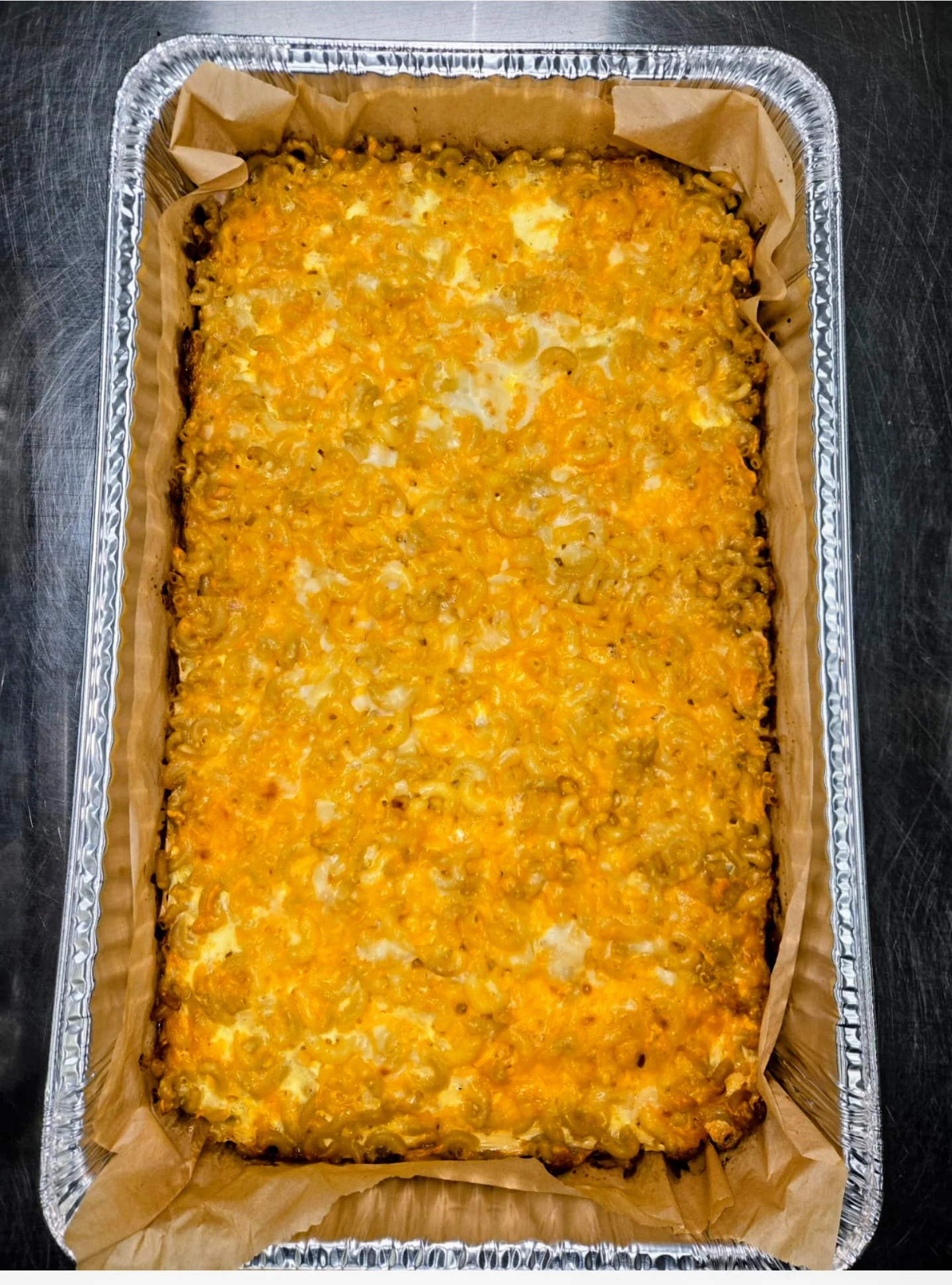 Baked macaroni and cheese casserole with golden crust