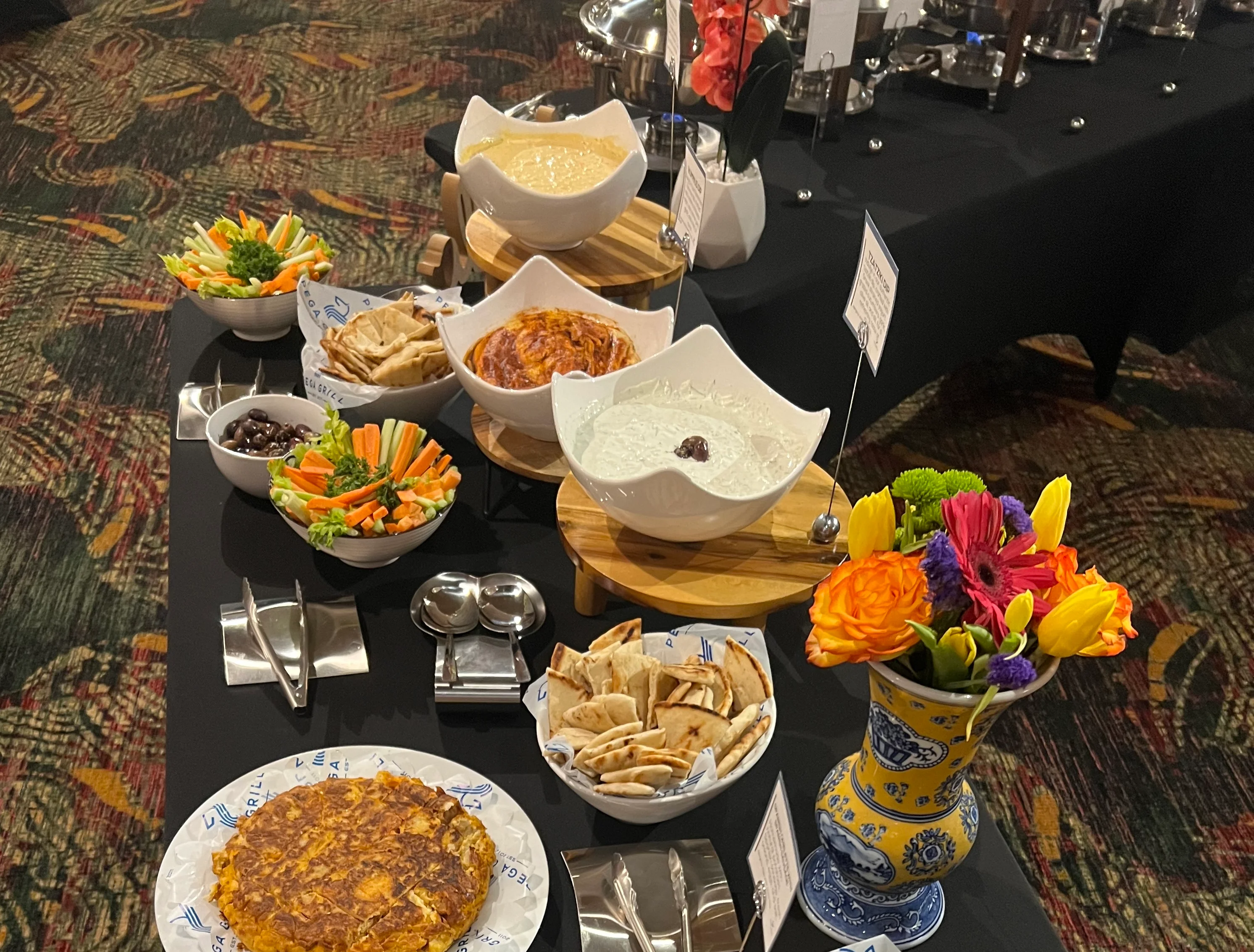A catering event off site with dishes served cocktail style image