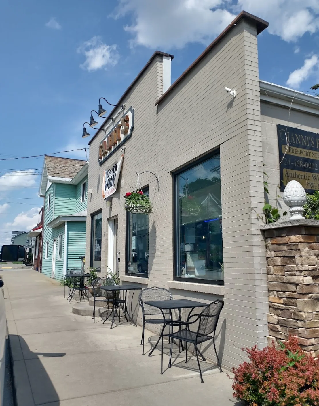 Charming restaurant exterior with outdoor seating
