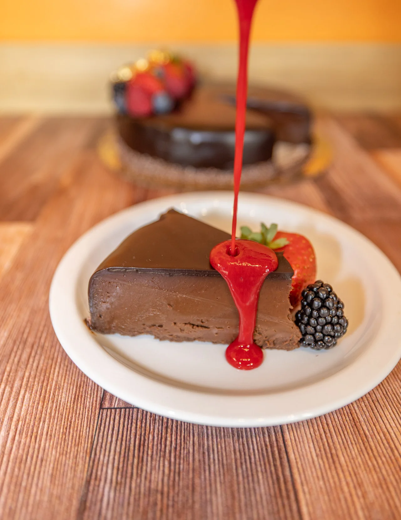 Decadent chocolate dessert with rich layers and garnishes