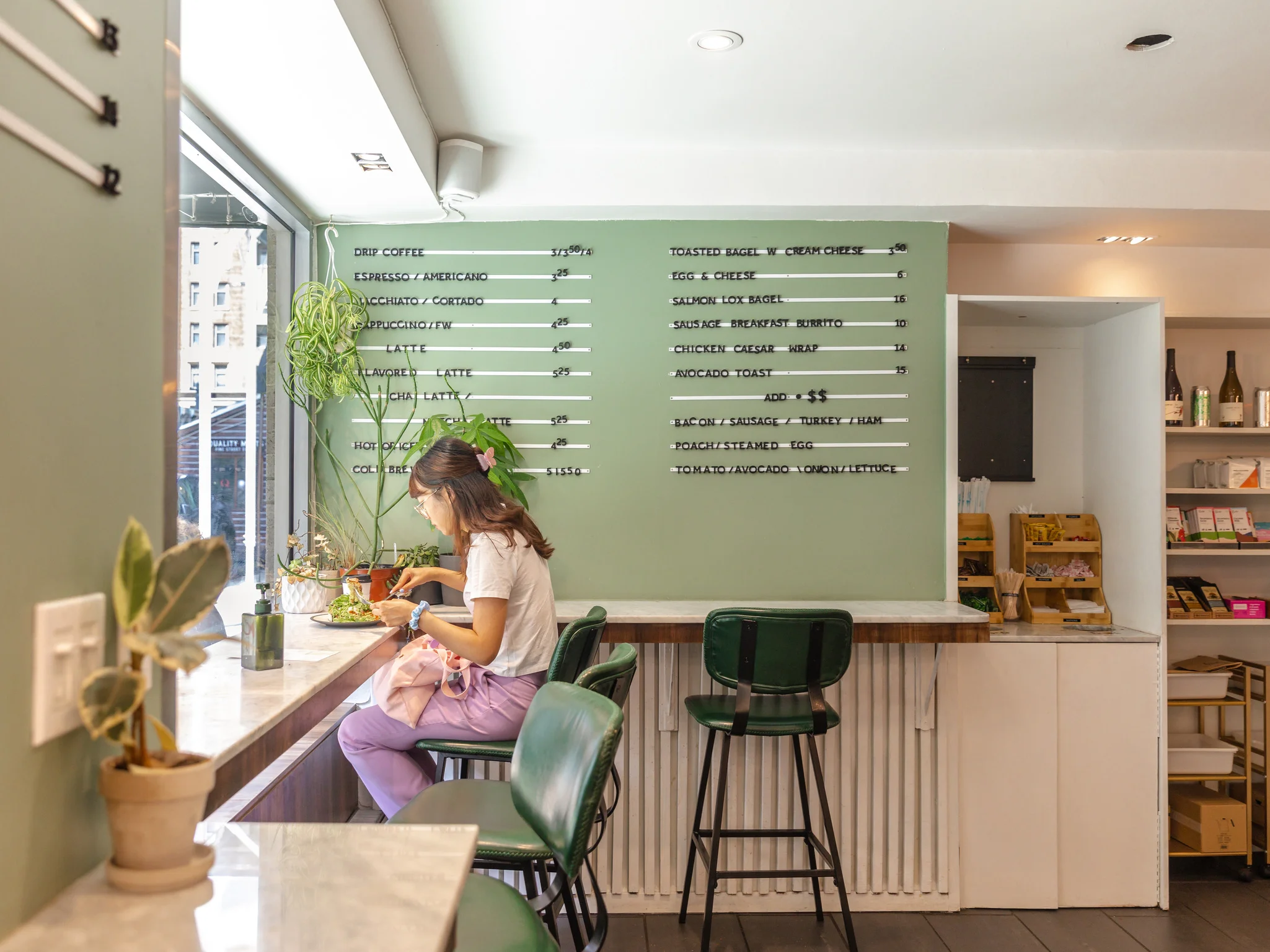 Cozy café interior with a customer enjoying a meal
