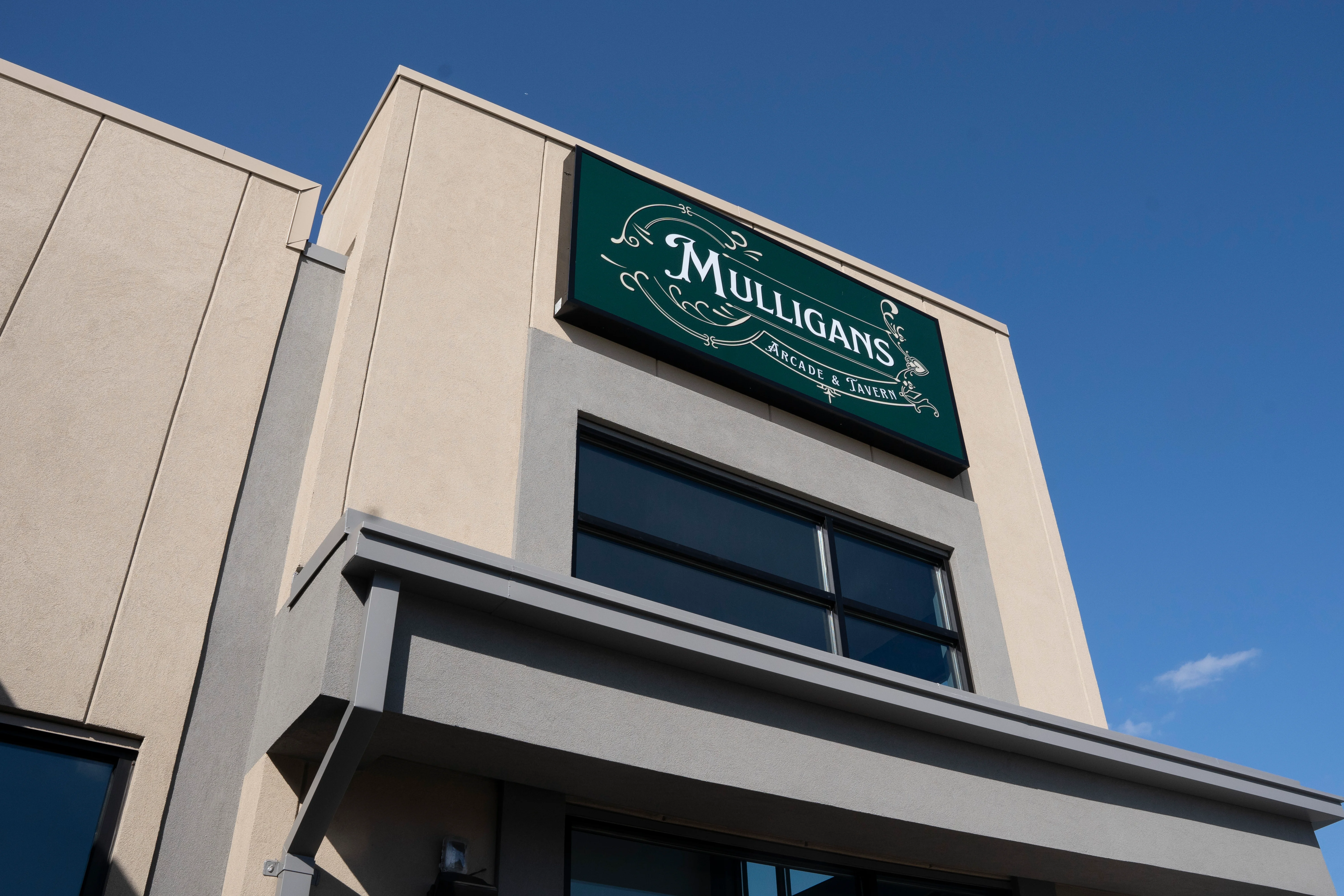Mulligans logo on sign above entrance