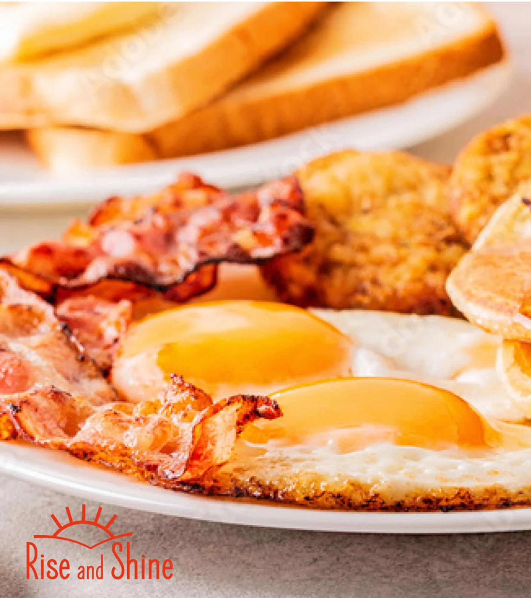 Classic American breakfast with eggs, bacon, and toast