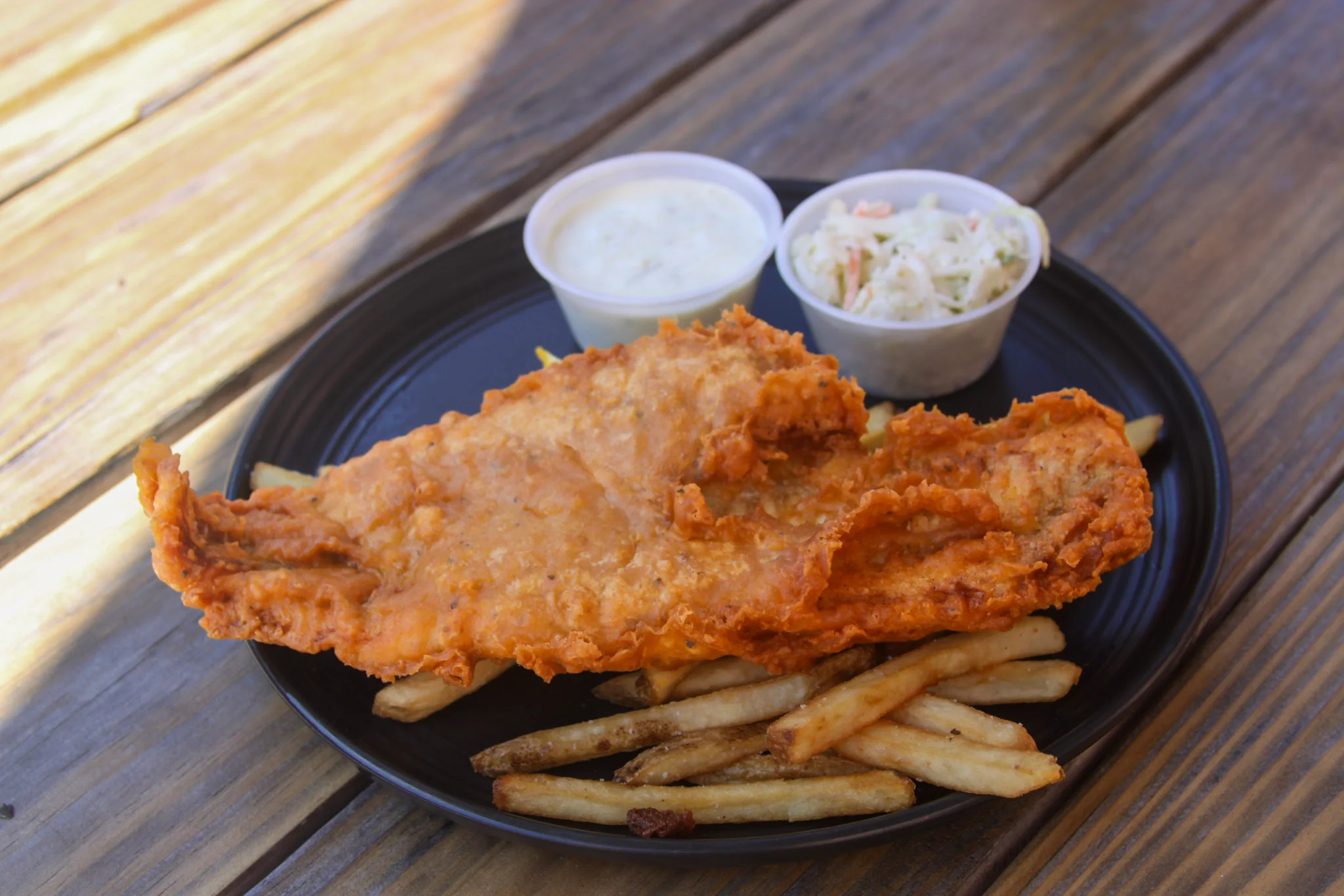 Southern fried catfish with fries and coleslaw