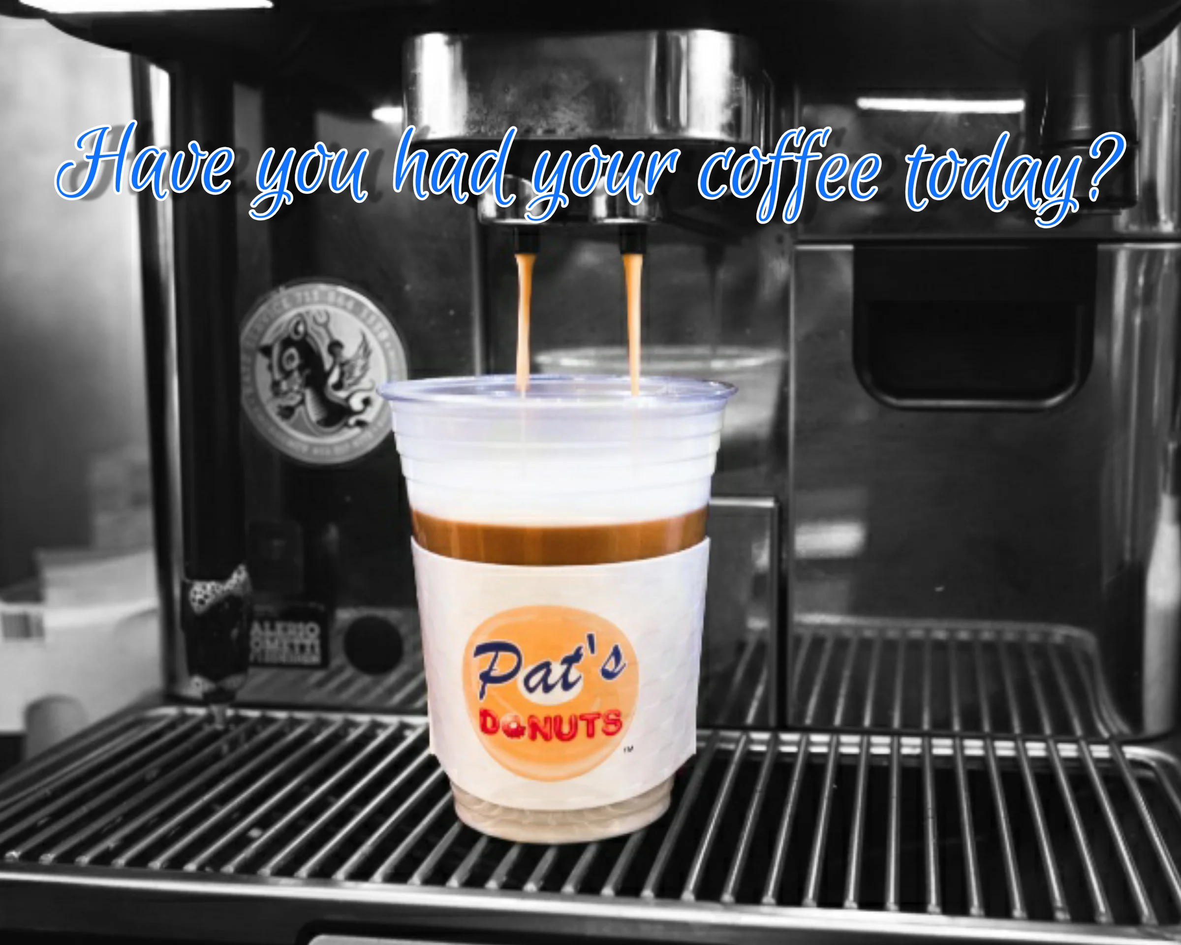 Freshly brewed coffee pouring into a cup