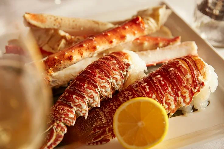 Platter of fresh seafood including lobster and crab legs