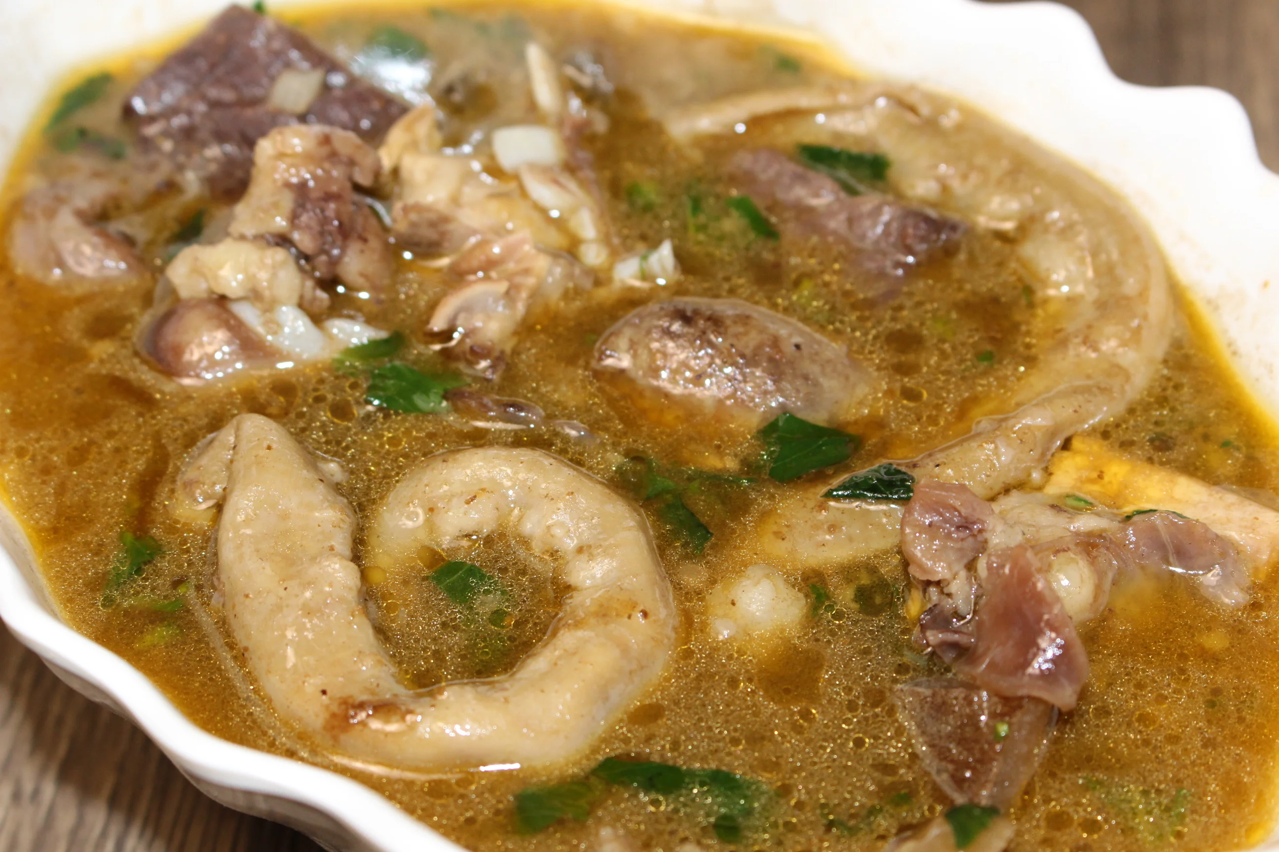 Traditional Mexican menudo soup with tripe and herbs