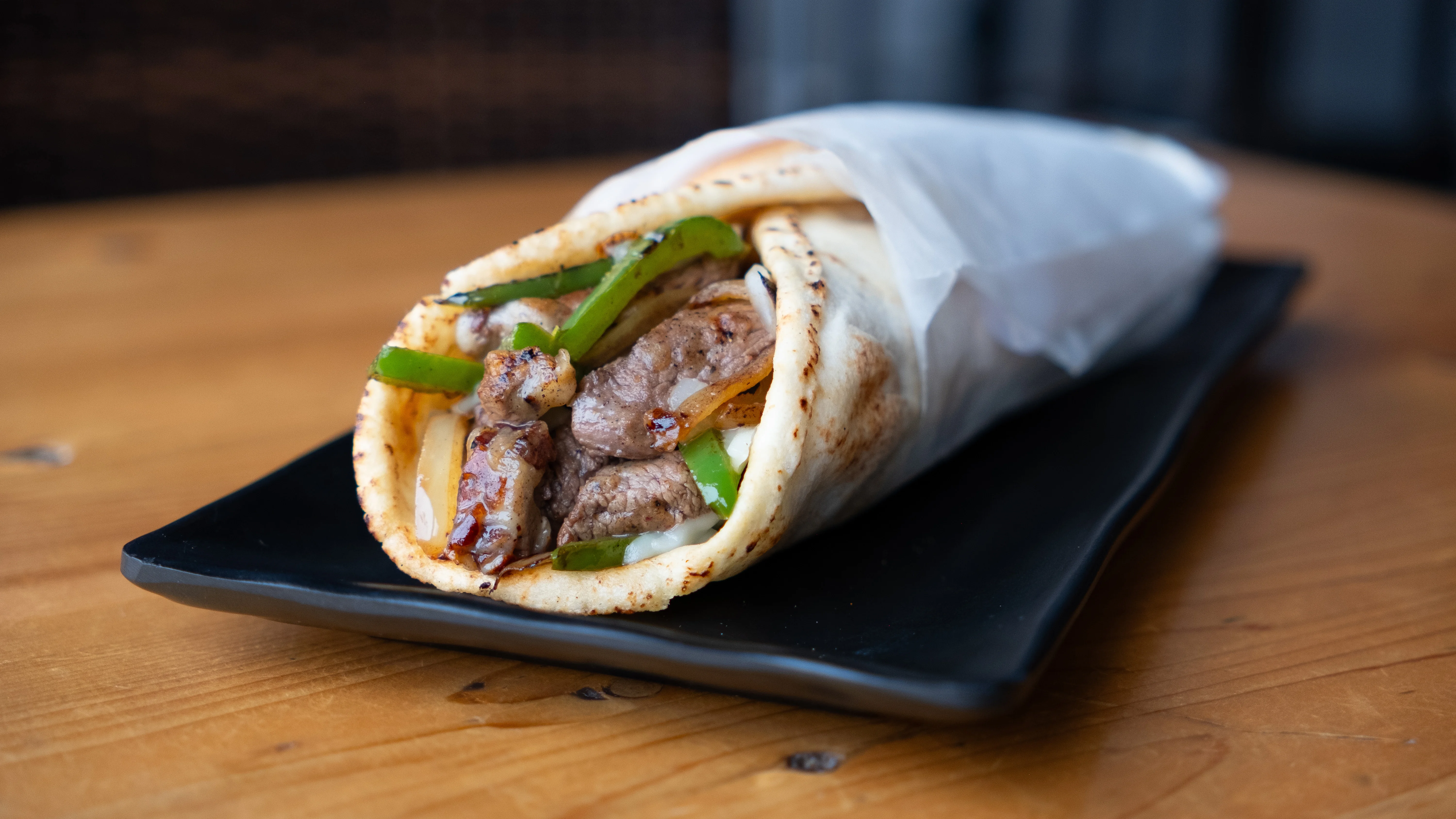 Delicious beef fajita wrap served in a warm tortilla