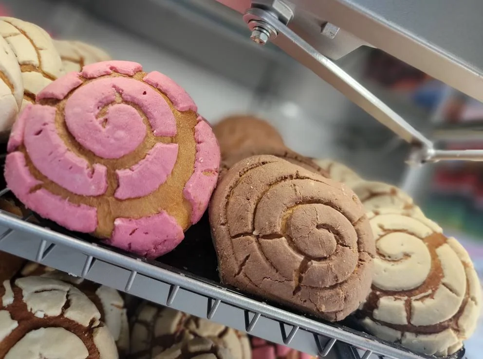 Colorful Mexican conchas on display