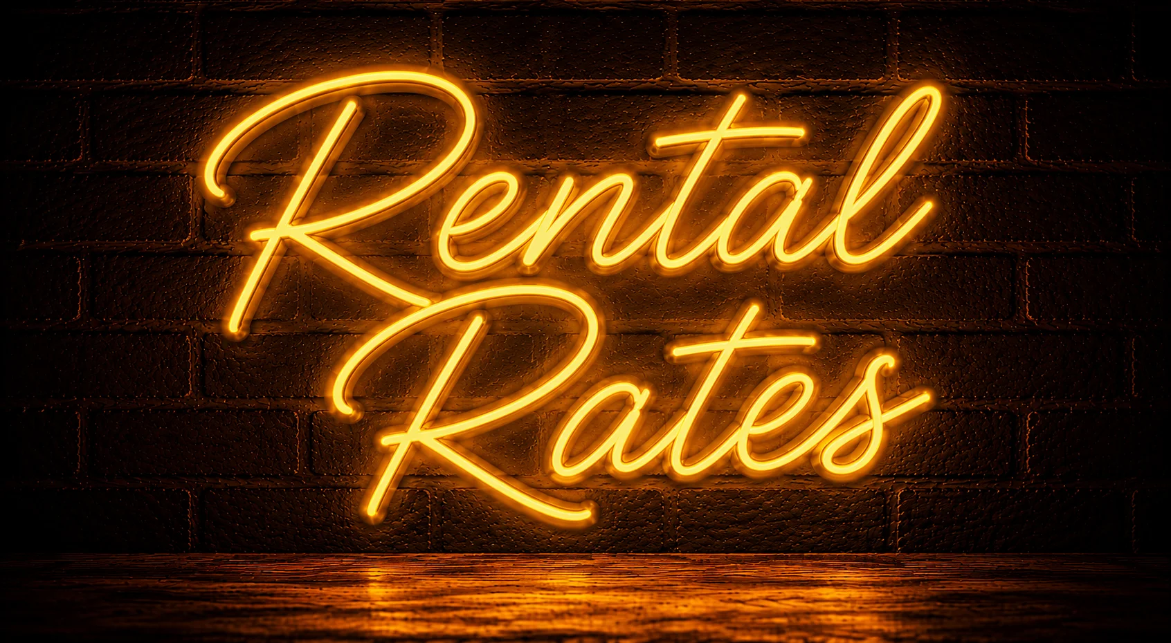 Neon sign displaying rental rates on a brick wall