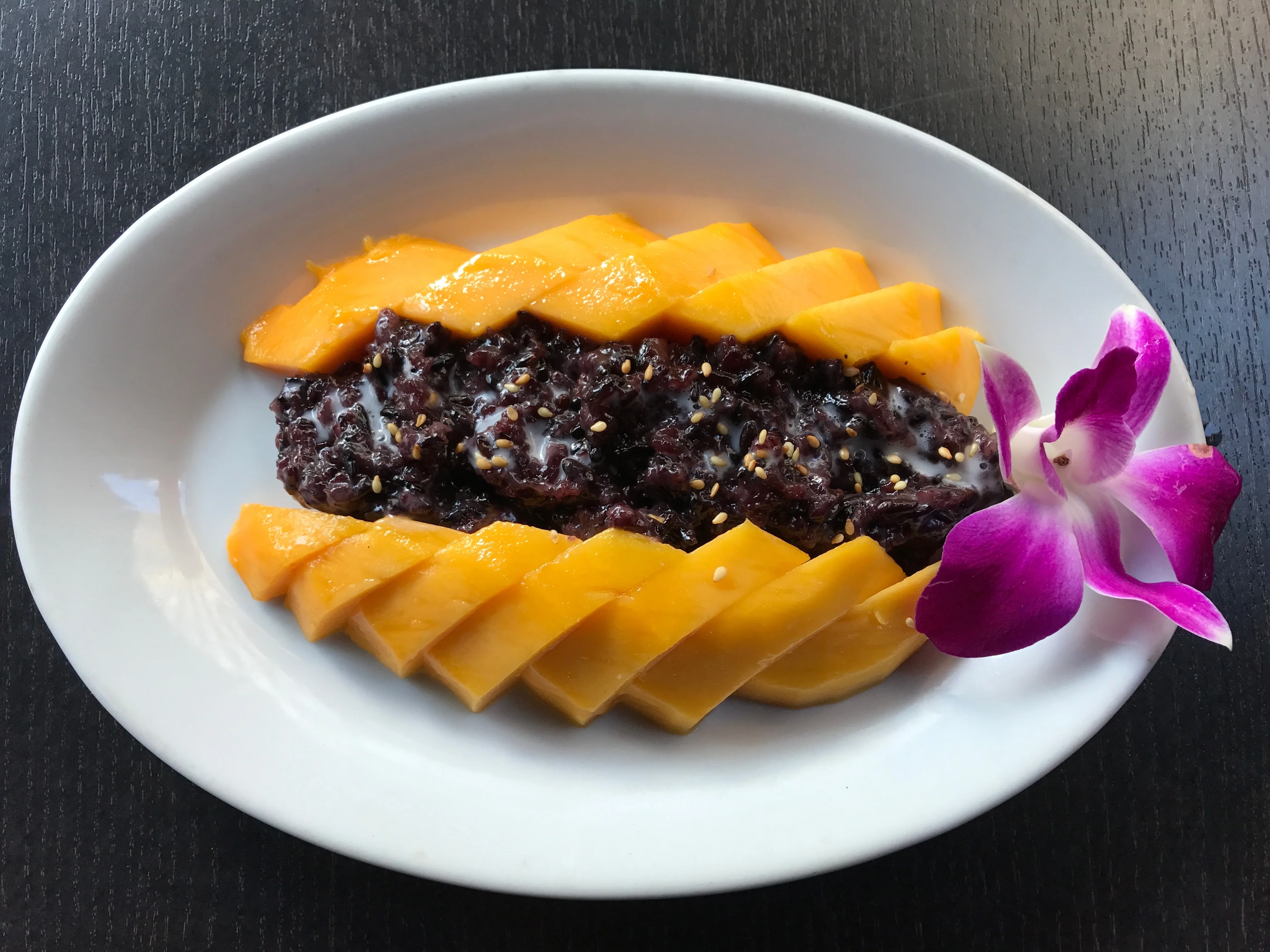 Thai mango sticky rice with black sticky rice and coconut cream