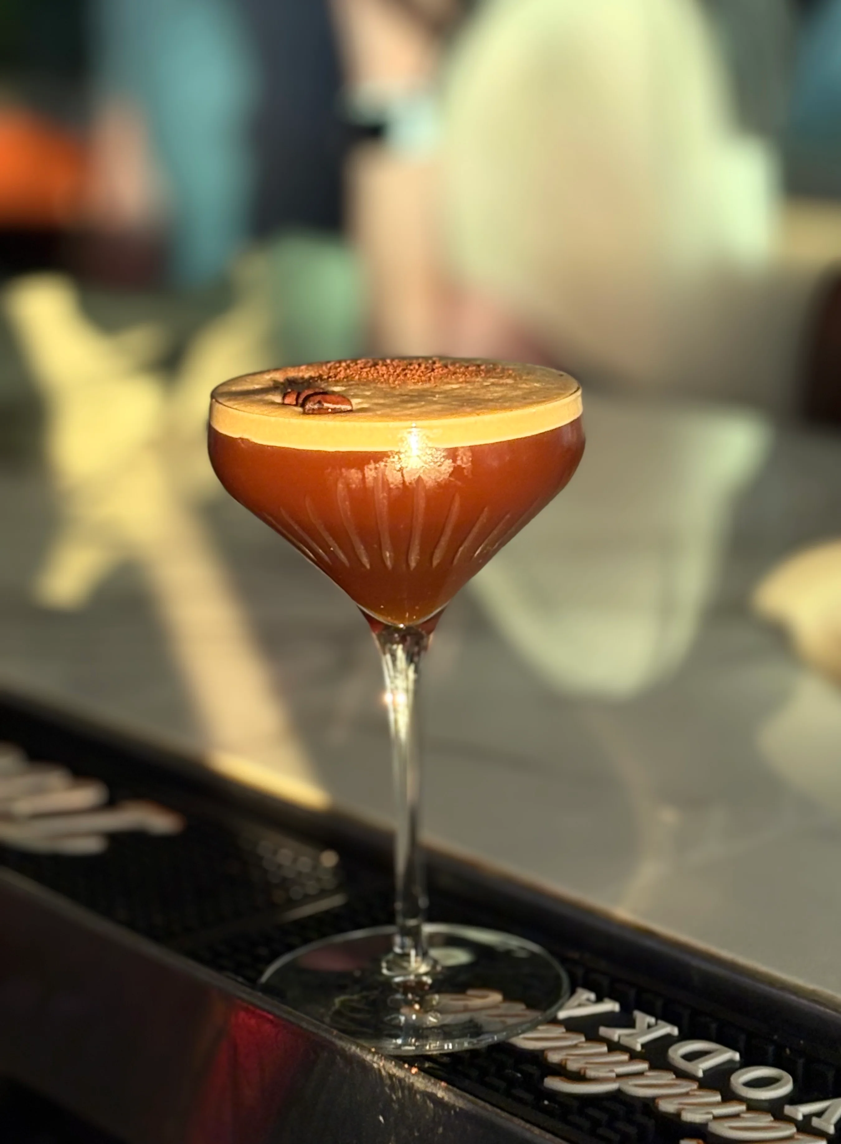 Espresso martini cocktail with coffee beans