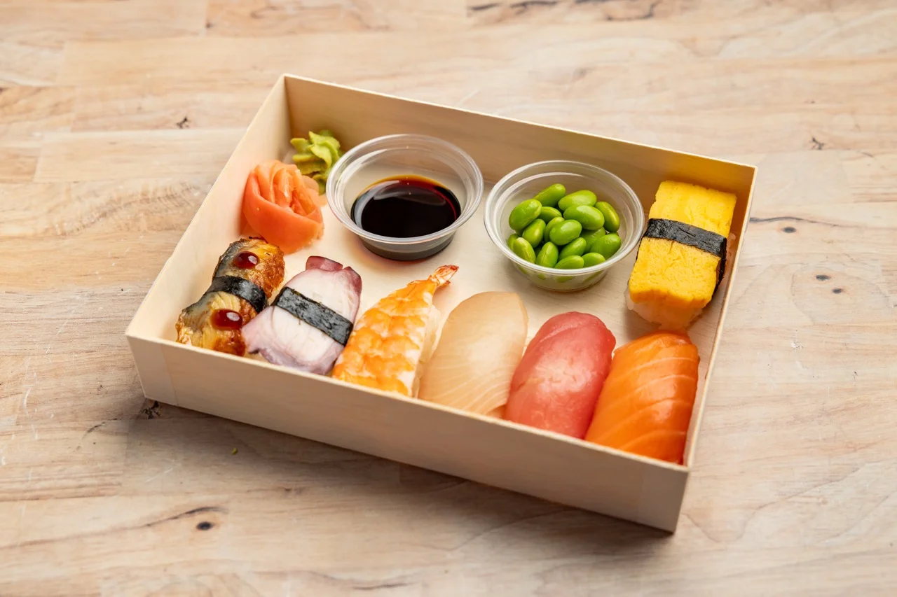 Assorted sushi platter with edamame and soy sauce