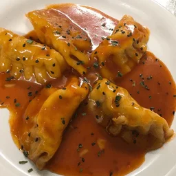 Chinese dumplings in sweet and spicy sauce