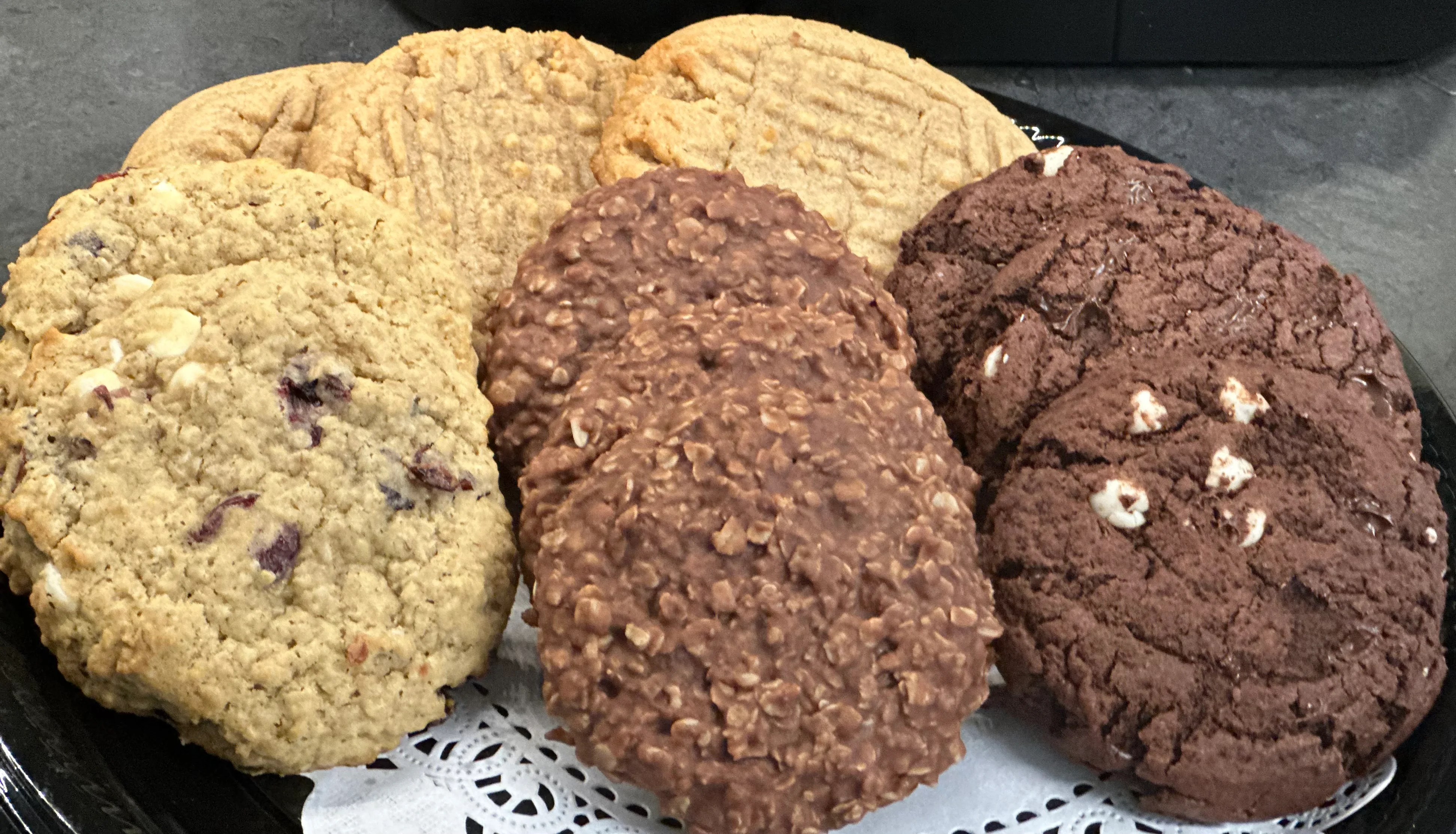 Assorted cookies including oatmeal and chocolate varieties