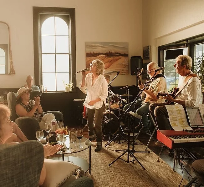 Live music performance in a cozy restaurant setting