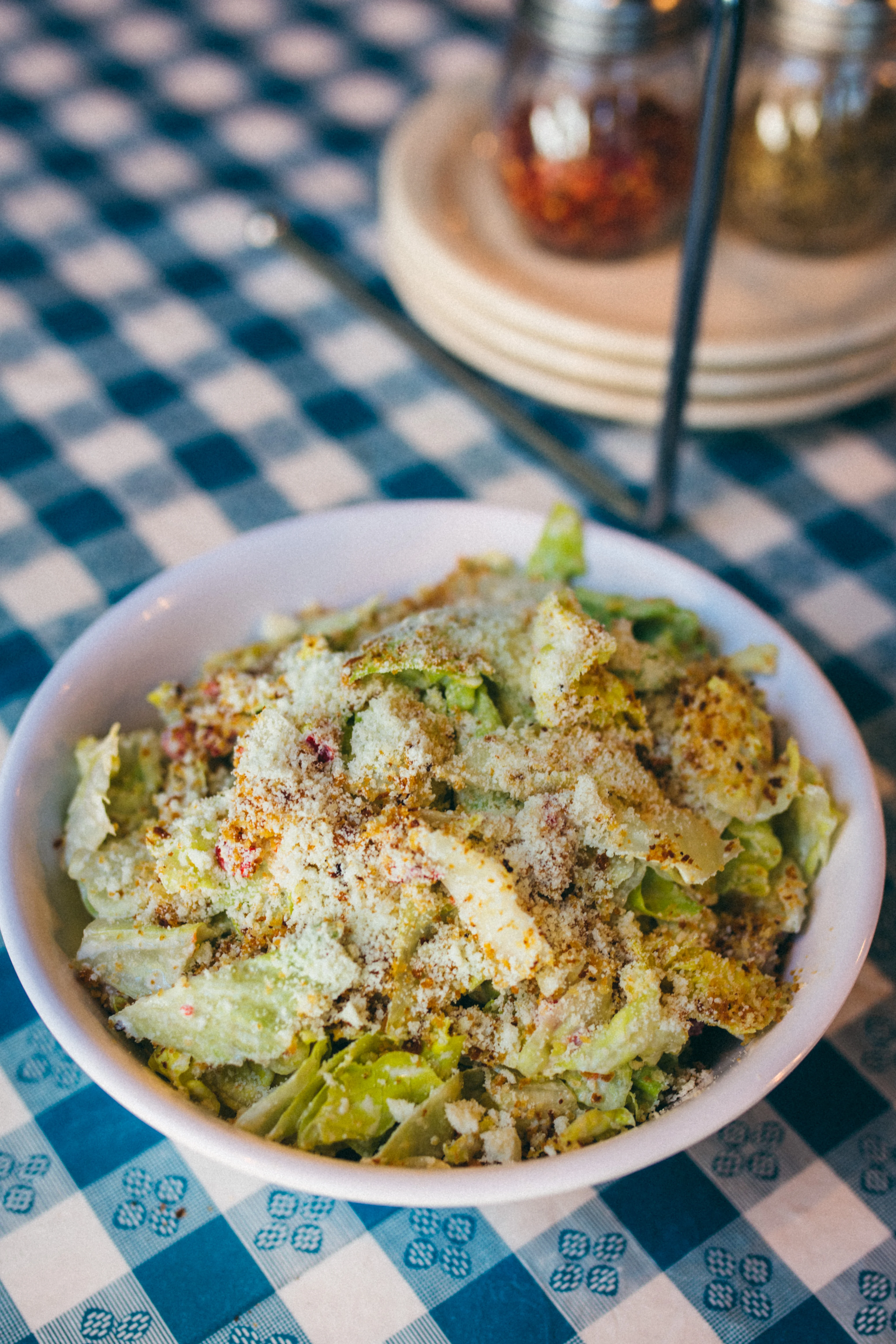 Classic Caesar salad topped with parmesan cheese