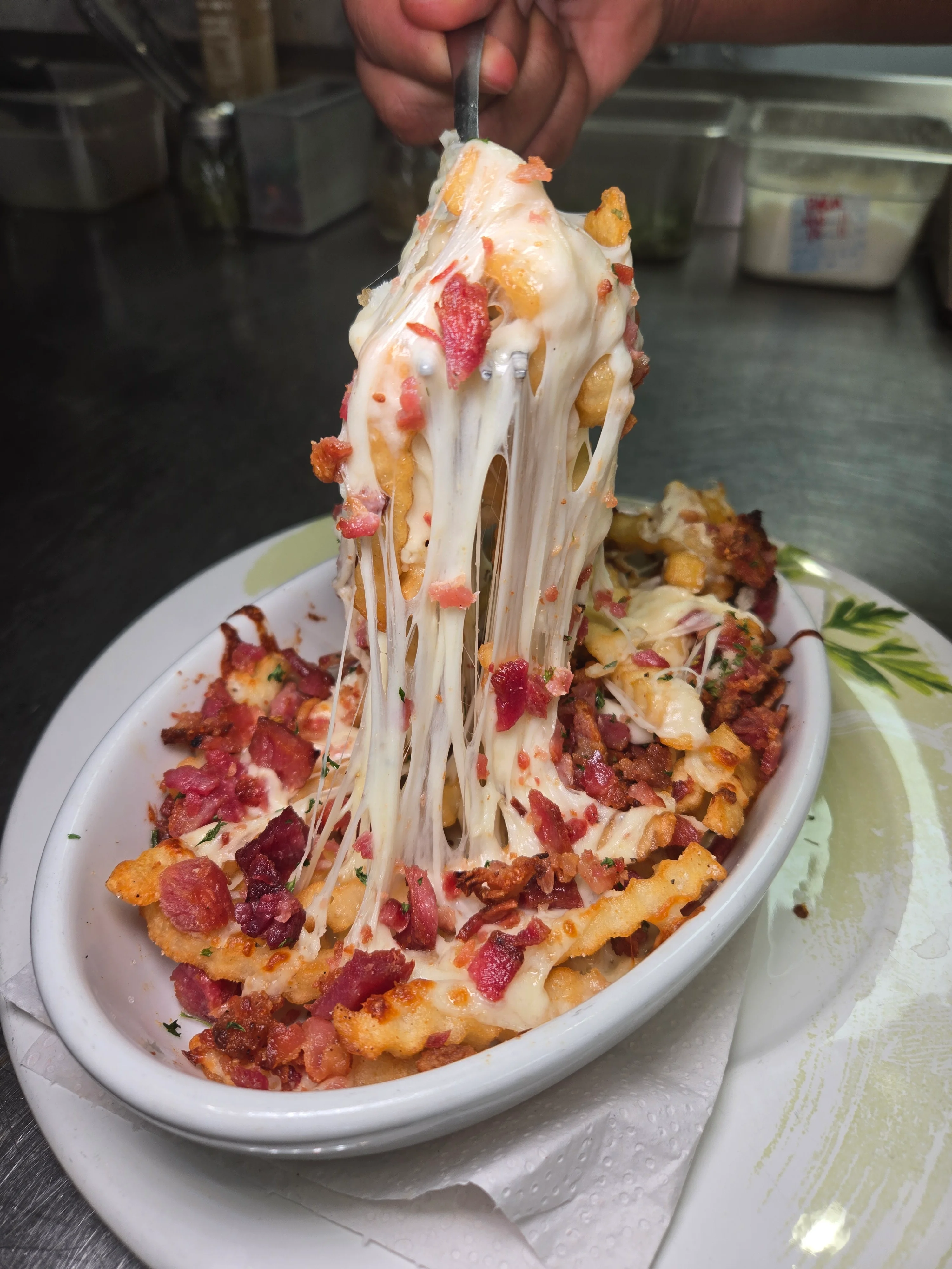 Loaded fries with lots of cheese and toppings