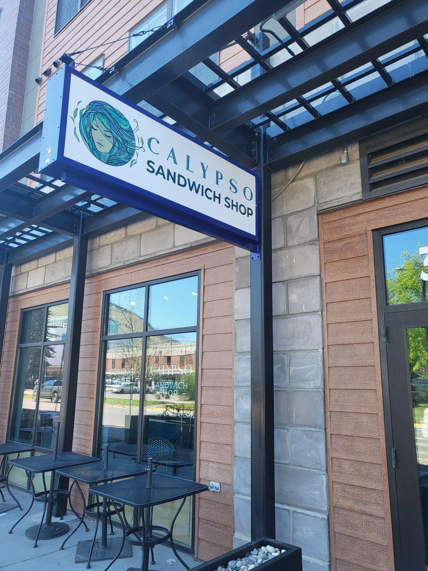 Exterior view of Calypso Sandwich Shop with outdoor seating