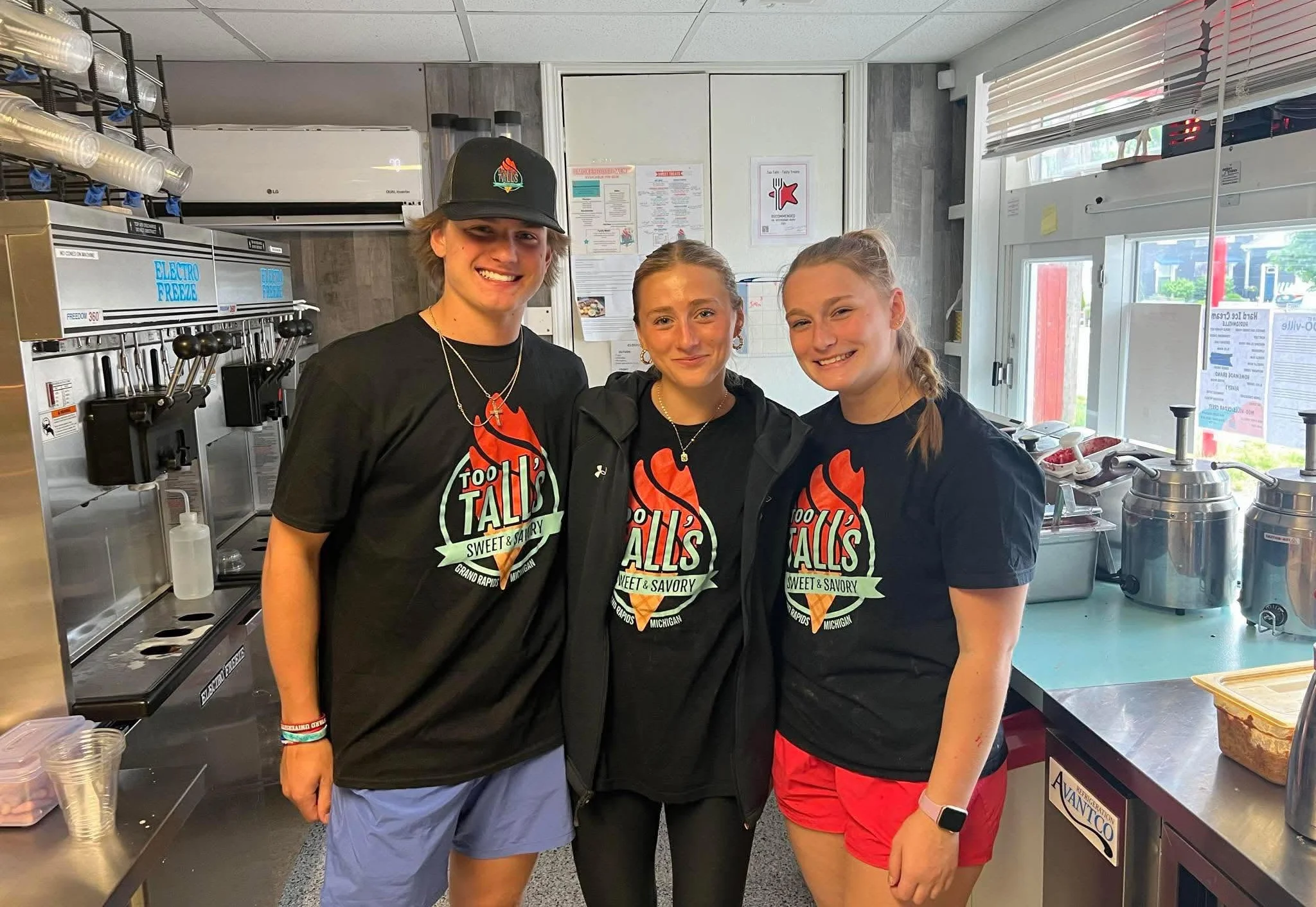 Staff members at Too Tall's Sweet & Savory ice cream shop