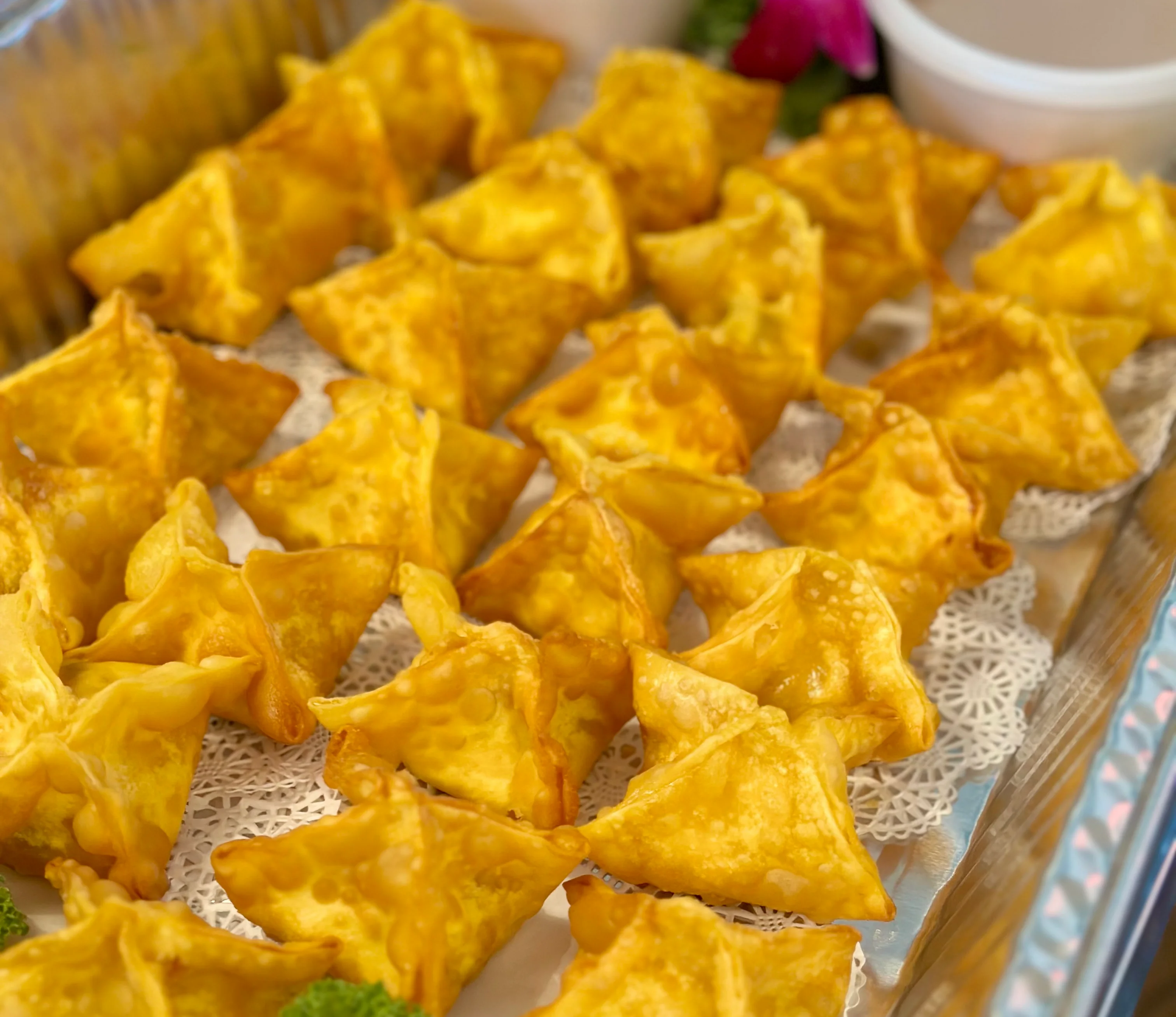 Crispy golden fried wontons served with dipping sauce