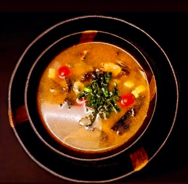 Japanese miso soup garnished with green onions