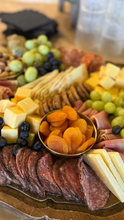 Artisanal charcuterie board with cheeses and fruits
