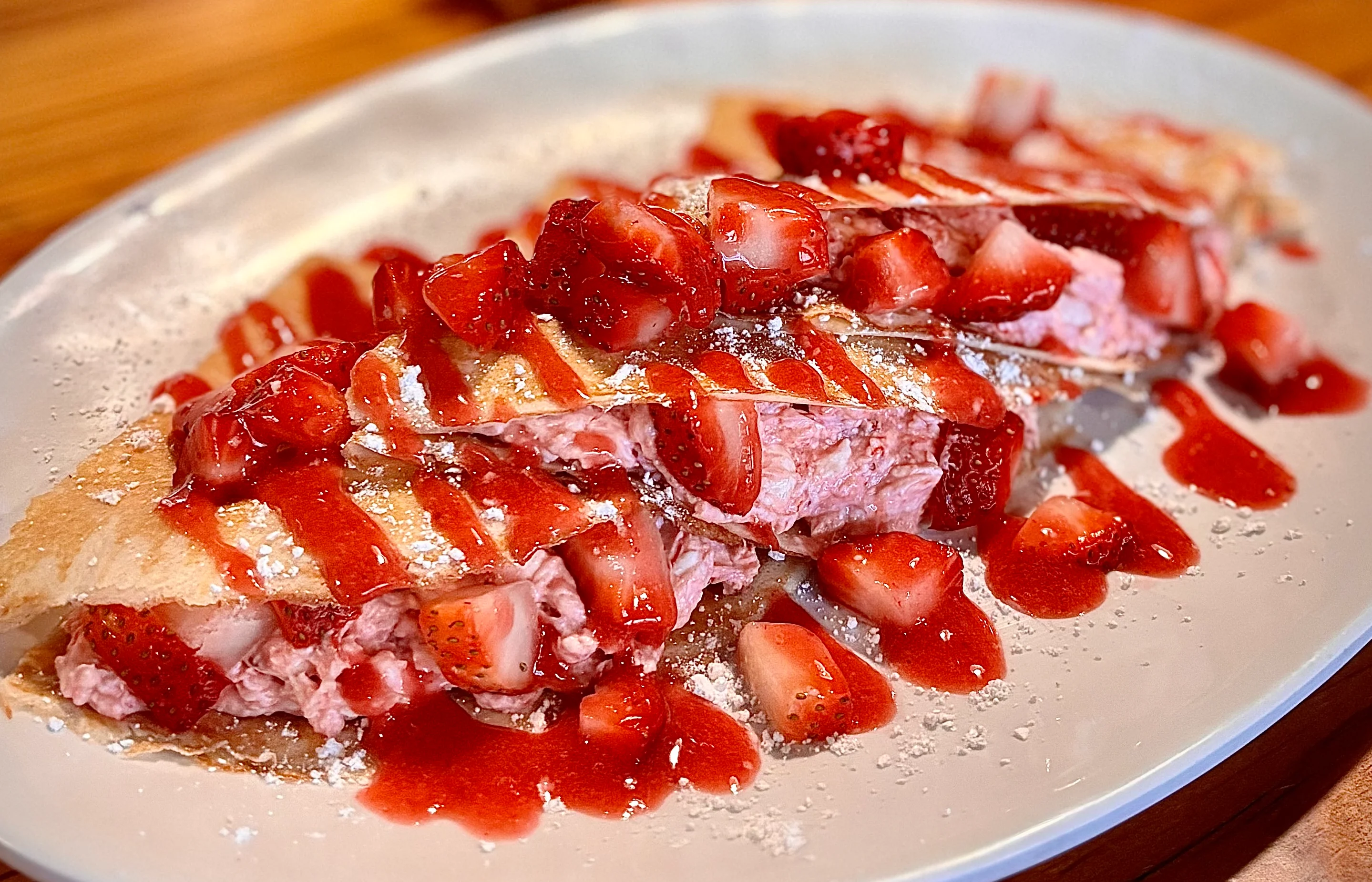 Strawberry mille-feuille dessert with fresh strawberries and sauce